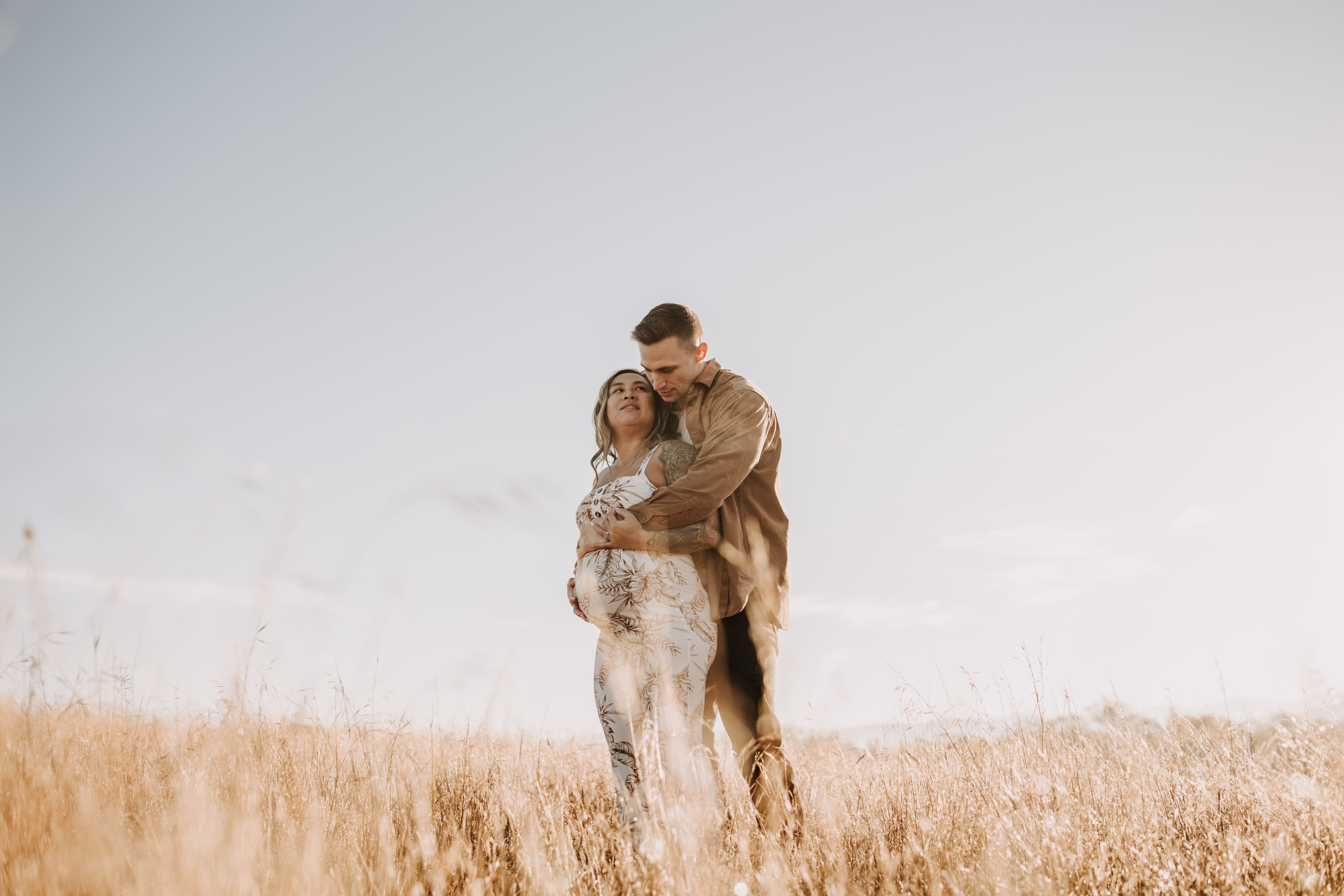 warm outdoor sunrise maternity photos San Diego brown tones backdrop pregnancy San Diego family photographer Sabrina kinsella