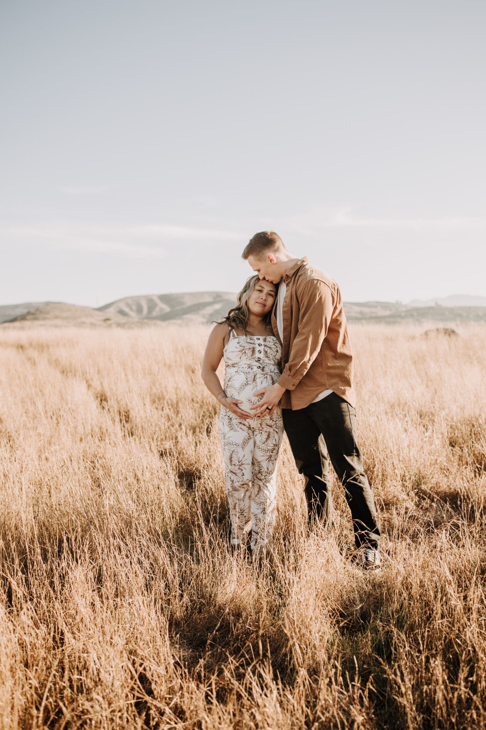 warm outdoor sunrise maternity photos San Diego brown tones backdrop pregnancy San Diego family photographer Sabrina kinsella