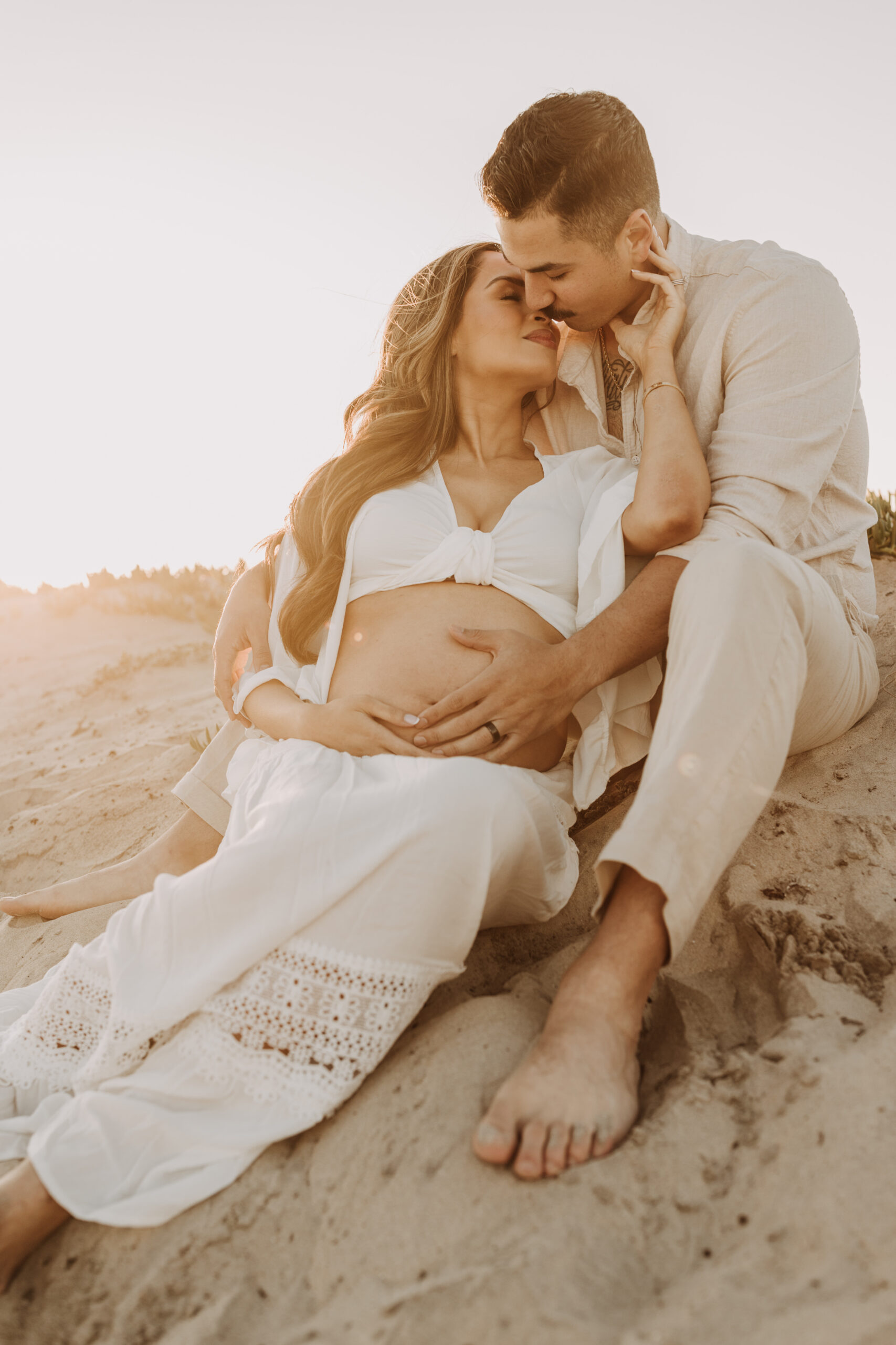 maternity fashion maternity photos beach photos sunset golden hour San Diego maternity photos blue dress pregnancy bright beautiful San Diego family photographer Sabrina kinsealla sabrinalynnphoto