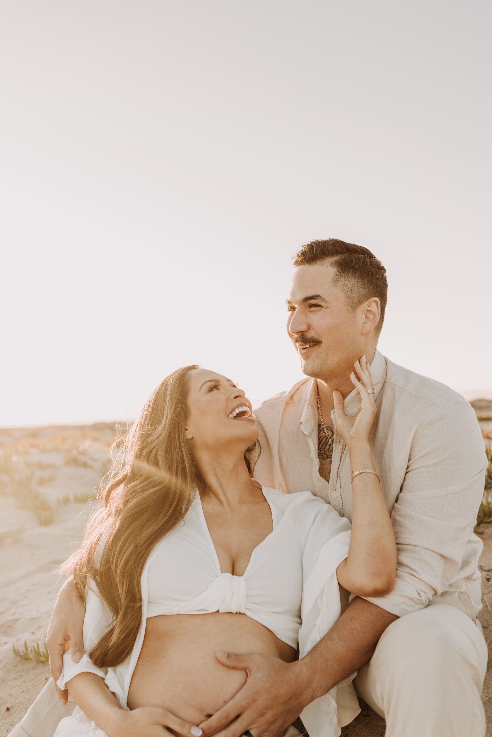 maternity fashion maternity photos beach photos sunset golden hour San Diego maternity photos blue dress pregnancy bright beautiful San Diego family photographer Sabrina kinsealla sabrinalynnphoto