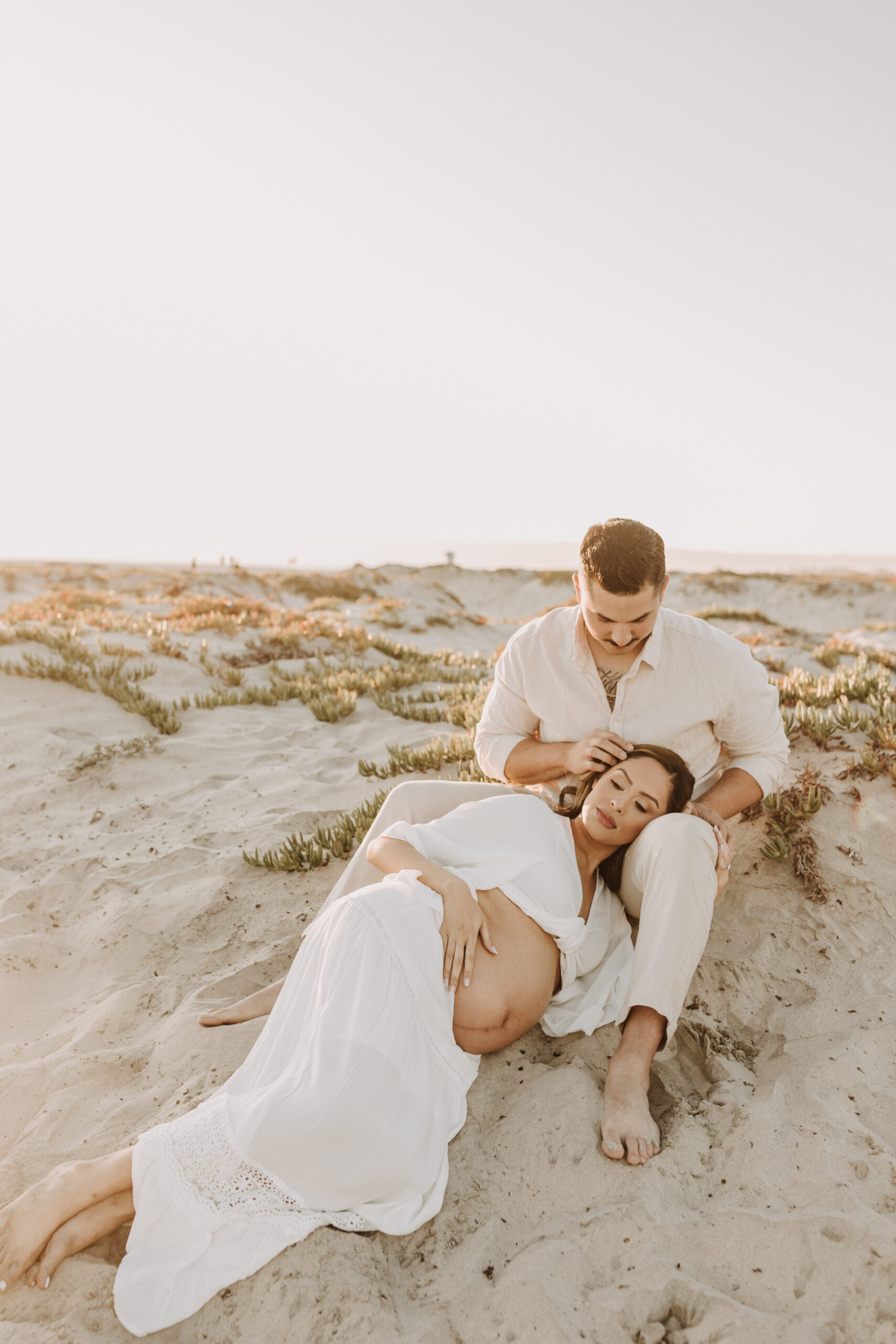 maternity fashion maternity photos beach photos sunset golden hour San Diego maternity photos blue dress pregnancy bright beautiful San Diego family photographer Sabrina kinsealla sabrinalynnphoto