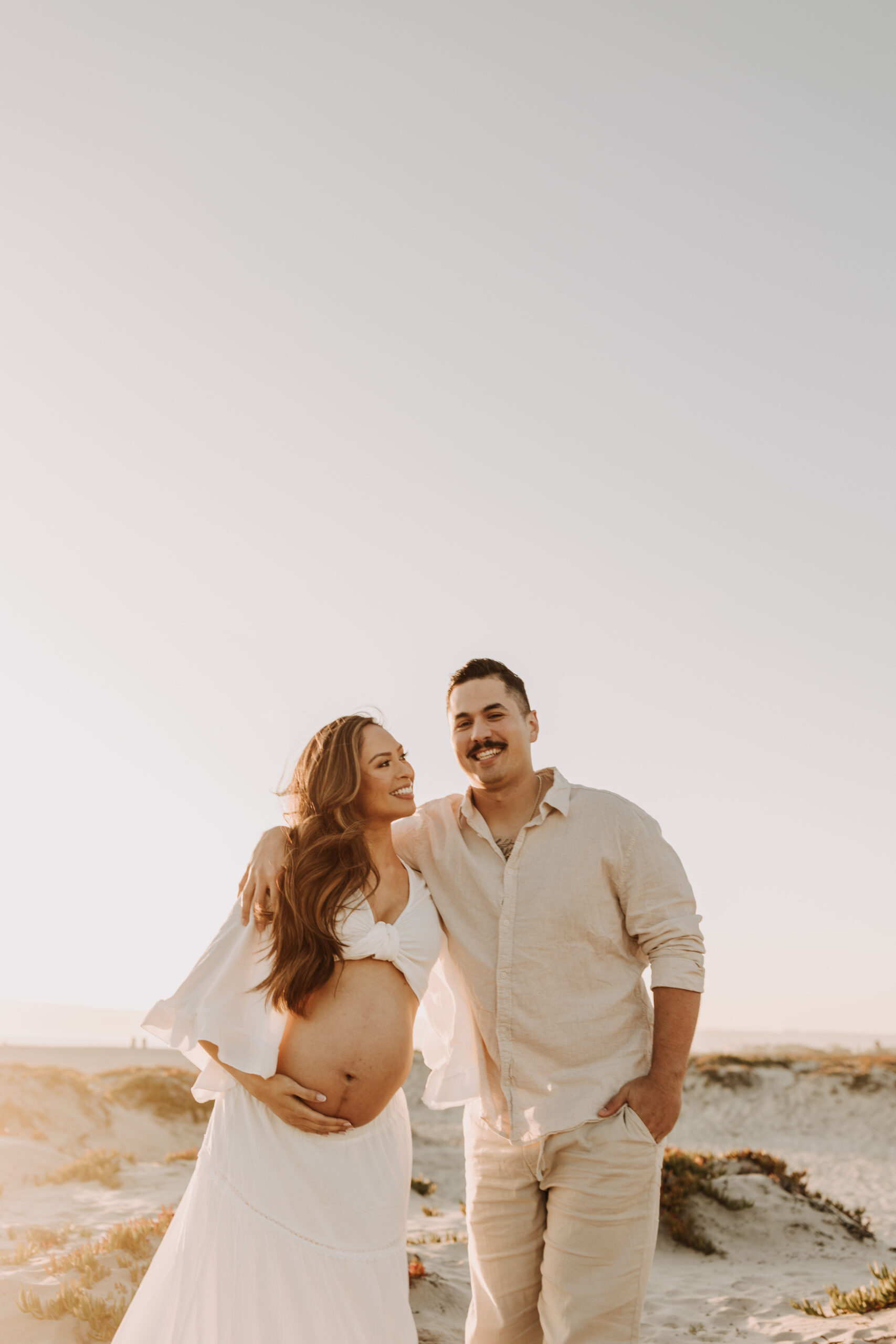 maternity fashion maternity photos beach photos sunset golden hour San Diego maternity photos blue dress pregnancy bright beautiful San Diego family photographer Sabrina kinsealla sabrinalynnphoto