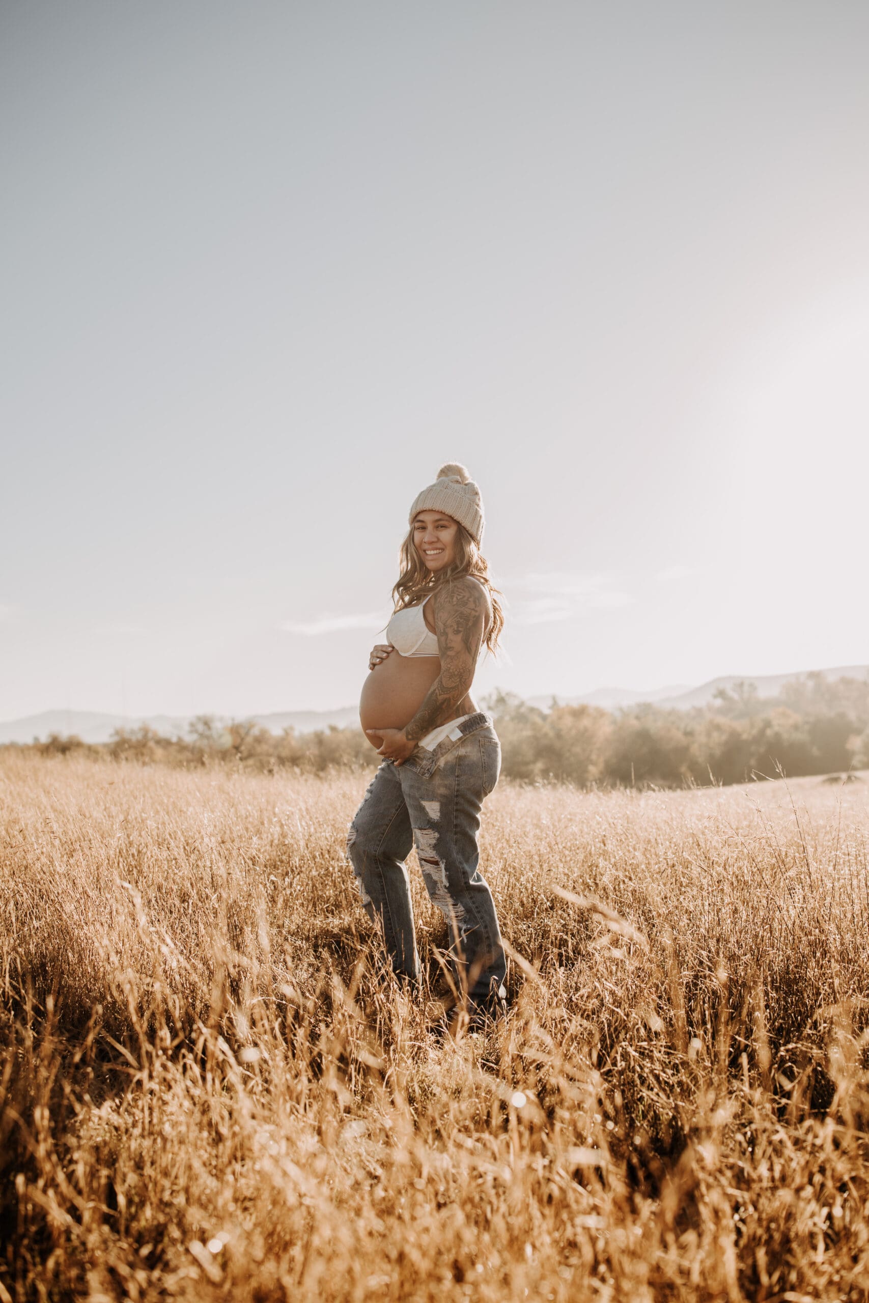 warm outdoor sunrise maternity photos San Diego brown tones backdrop pregnancy San Diego family photographer Sabrina kinsella