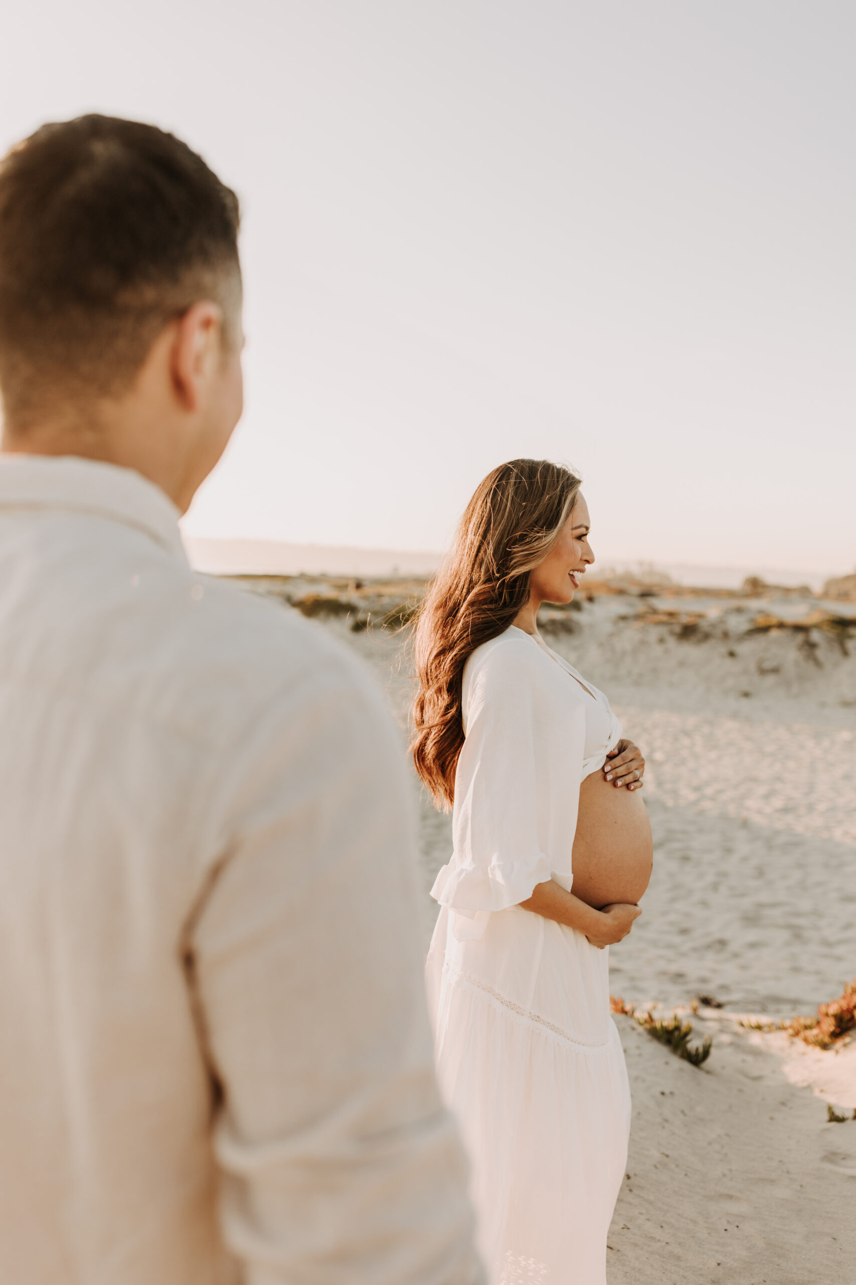 maternity fashion maternity photos beach photos sunset golden hour San Diego maternity photos blue dress pregnancy bright beautiful San Diego family photographer Sabrina kinsealla sabrinalynnphoto