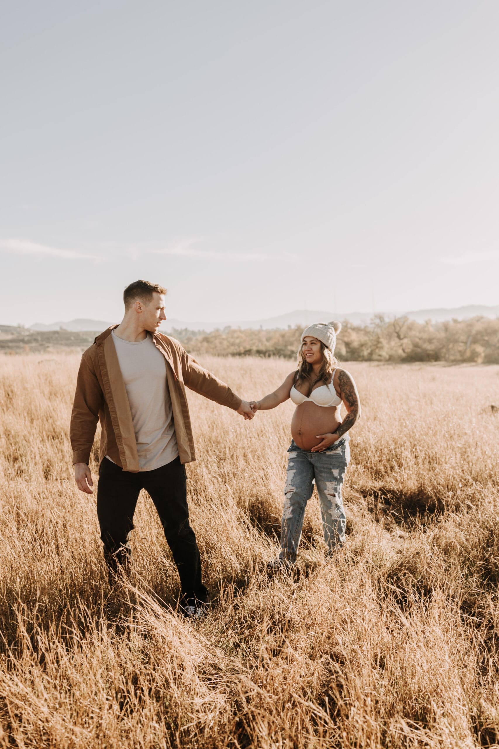 warm outdoor sunrise maternity photos San Diego brown tones backdrop pregnancy San Diego family photographer Sabrina kinsella