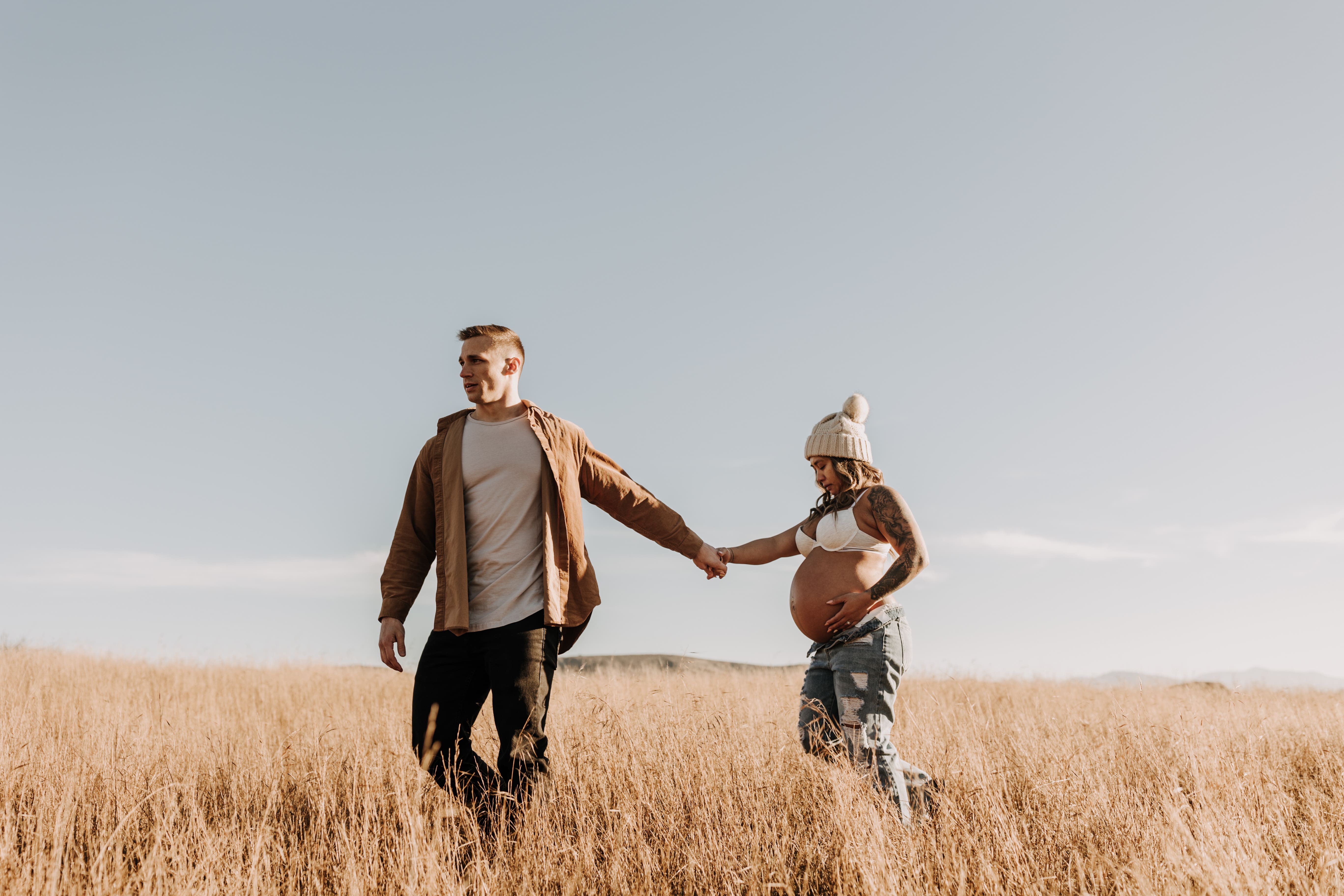 warm outdoor sunrise maternity photos San Diego brown tones backdrop pregnancy San Diego family photographer Sabrina kinsella