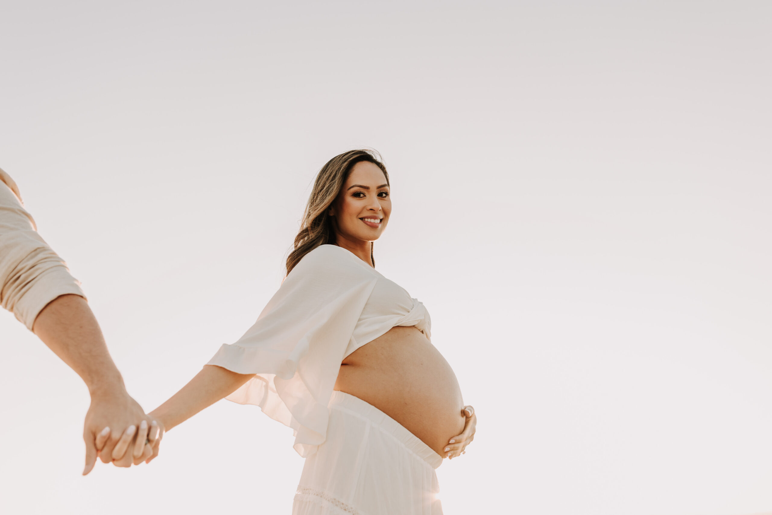 maternity fashion maternity photos beach photos sunset golden hour San Diego maternity photos blue dress pregnancy bright beautiful San Diego family photographer Sabrina kinsealla sabrinalynnphoto