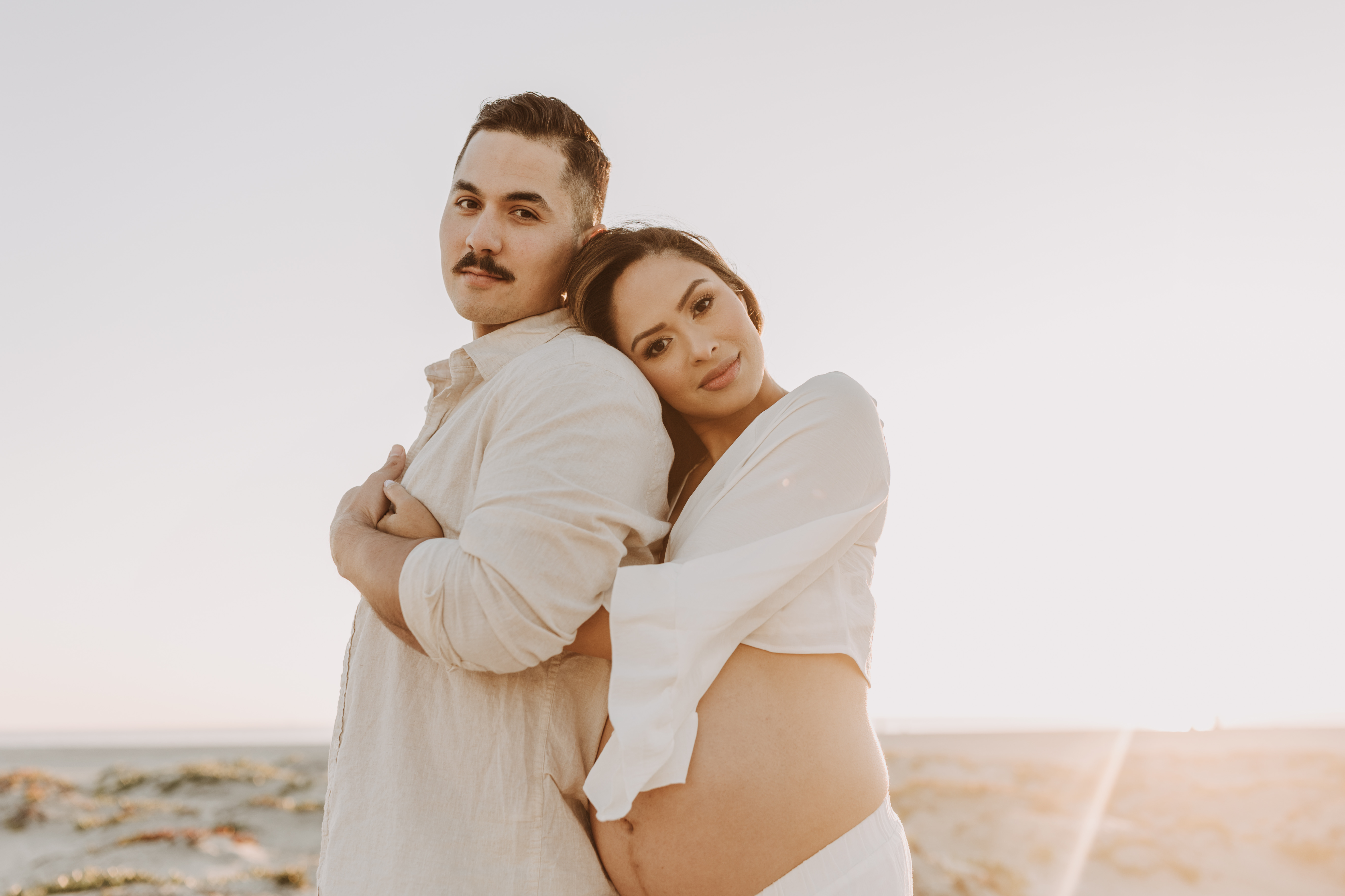 maternity fashion maternity photos beach photos sunset golden hour San Diego maternity photos blue dress pregnancy bright beautiful San Diego family photographer Sabrina kinsealla sabrinalynnphoto