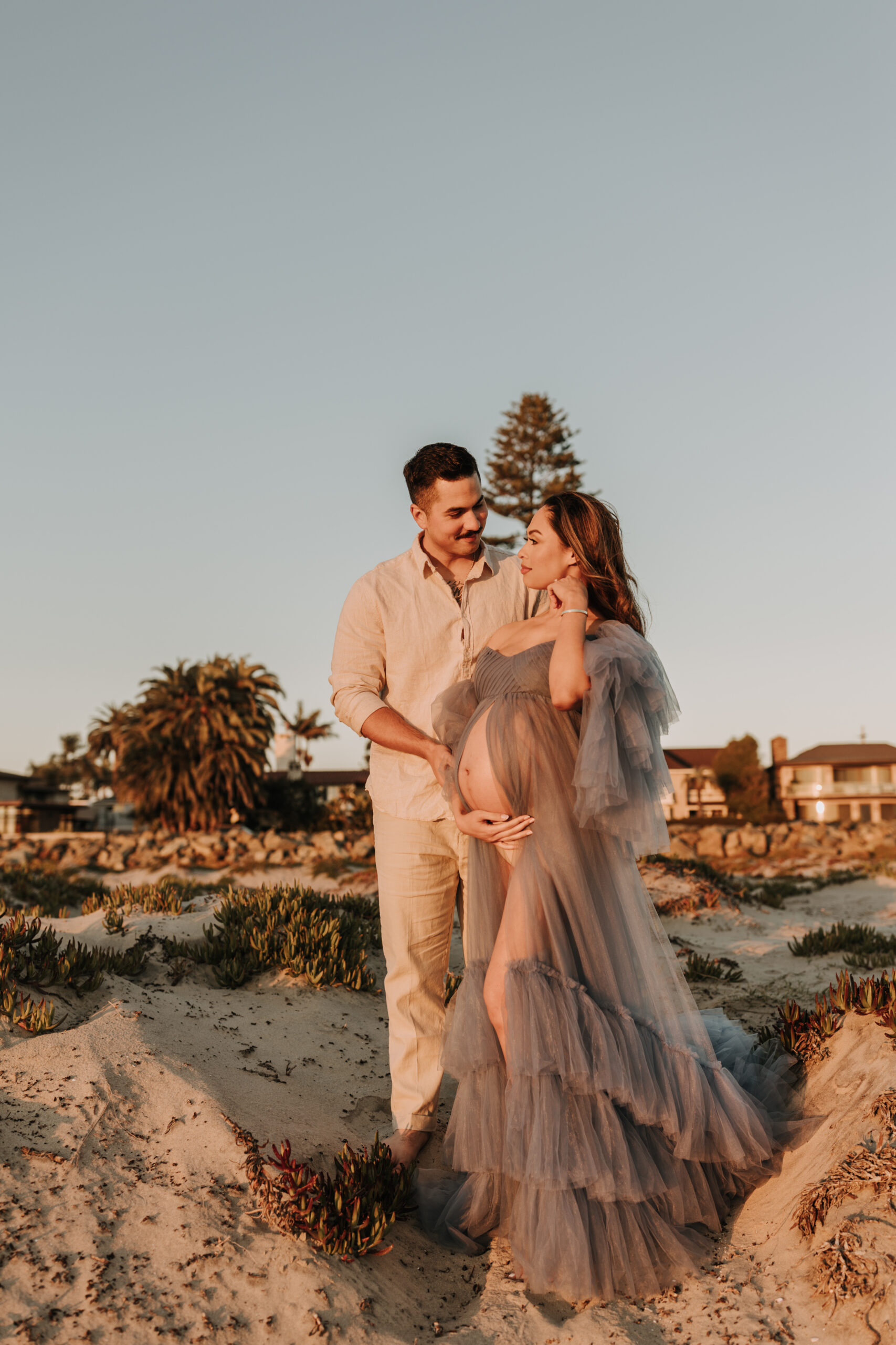 maternity fashion maternity photos beach photos sunset golden hour San Diego maternity photos blue dress pregnancy bright beautiful San Diego family photographer Sabrina kinsealla sabrinalynnphoto