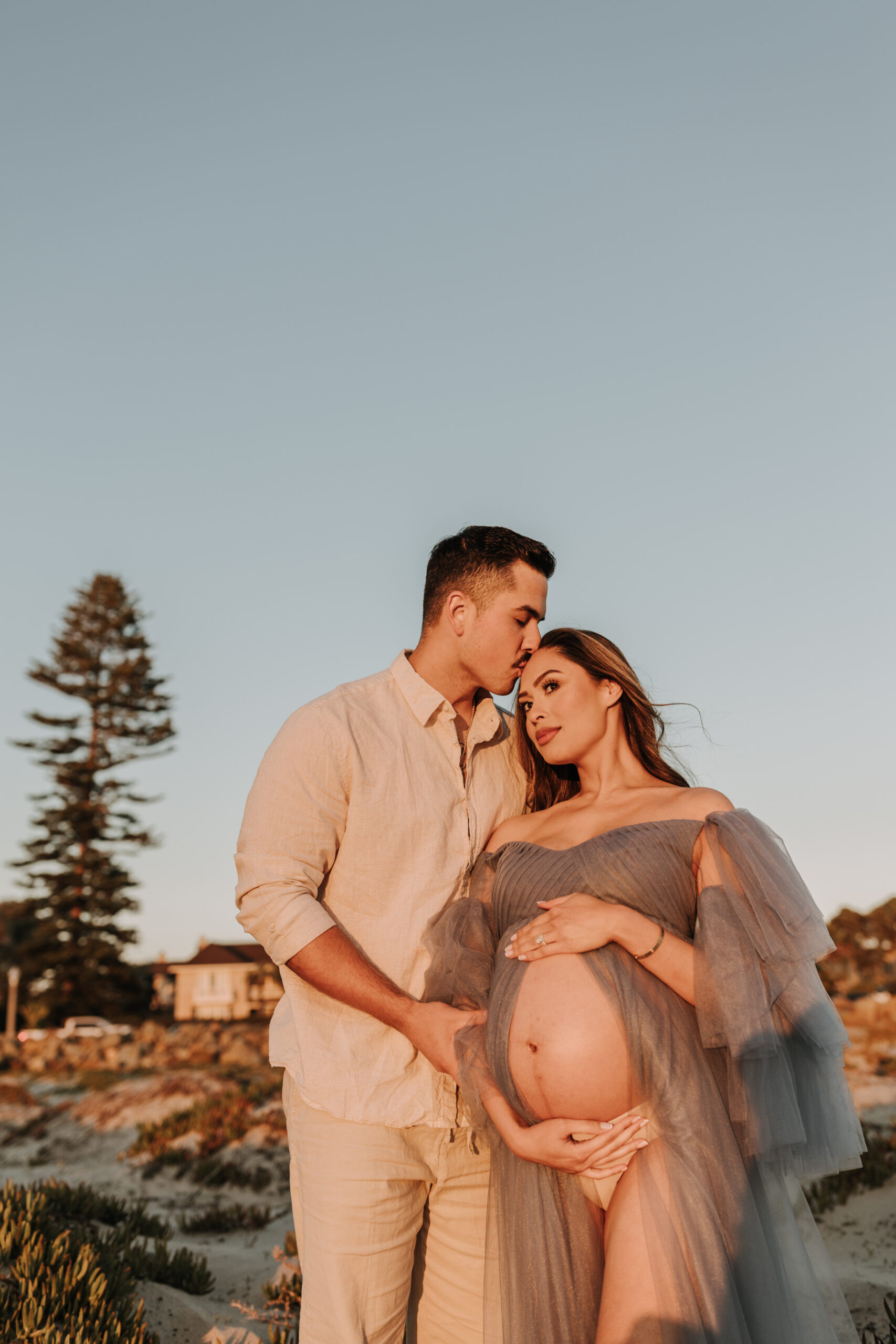 maternity fashion maternity photos beach photos sunset golden hour San Diego maternity photos blue dress pregnancy bright beautiful San Diego family photographer Sabrina kinsealla sabrinalynnphoto