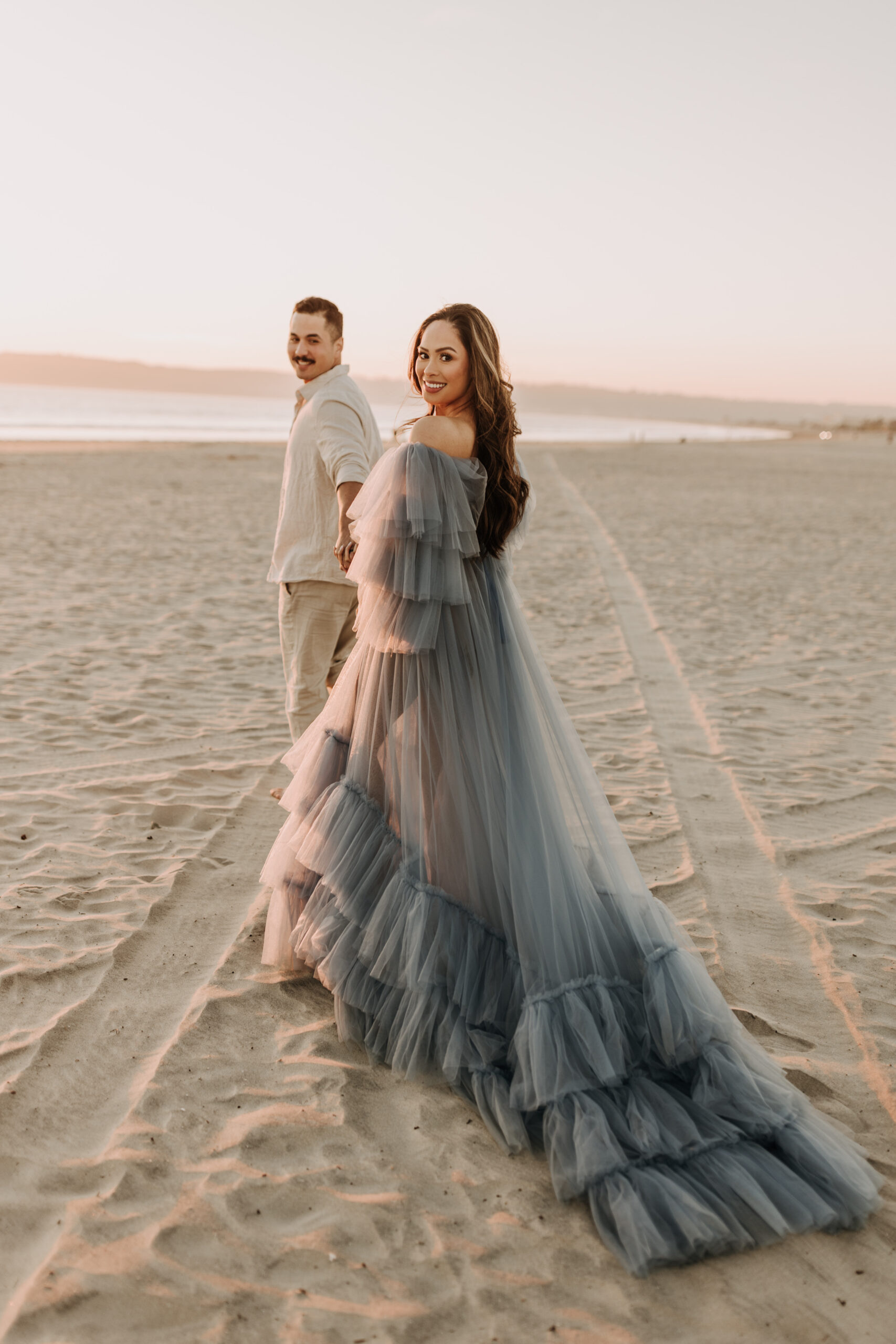 maternity fashion maternity photos beach photos sunset golden hour San Diego maternity photos blue dress pregnancy bright beautiful San Diego family photographer Sabrina kinsealla sabrinalynnphoto