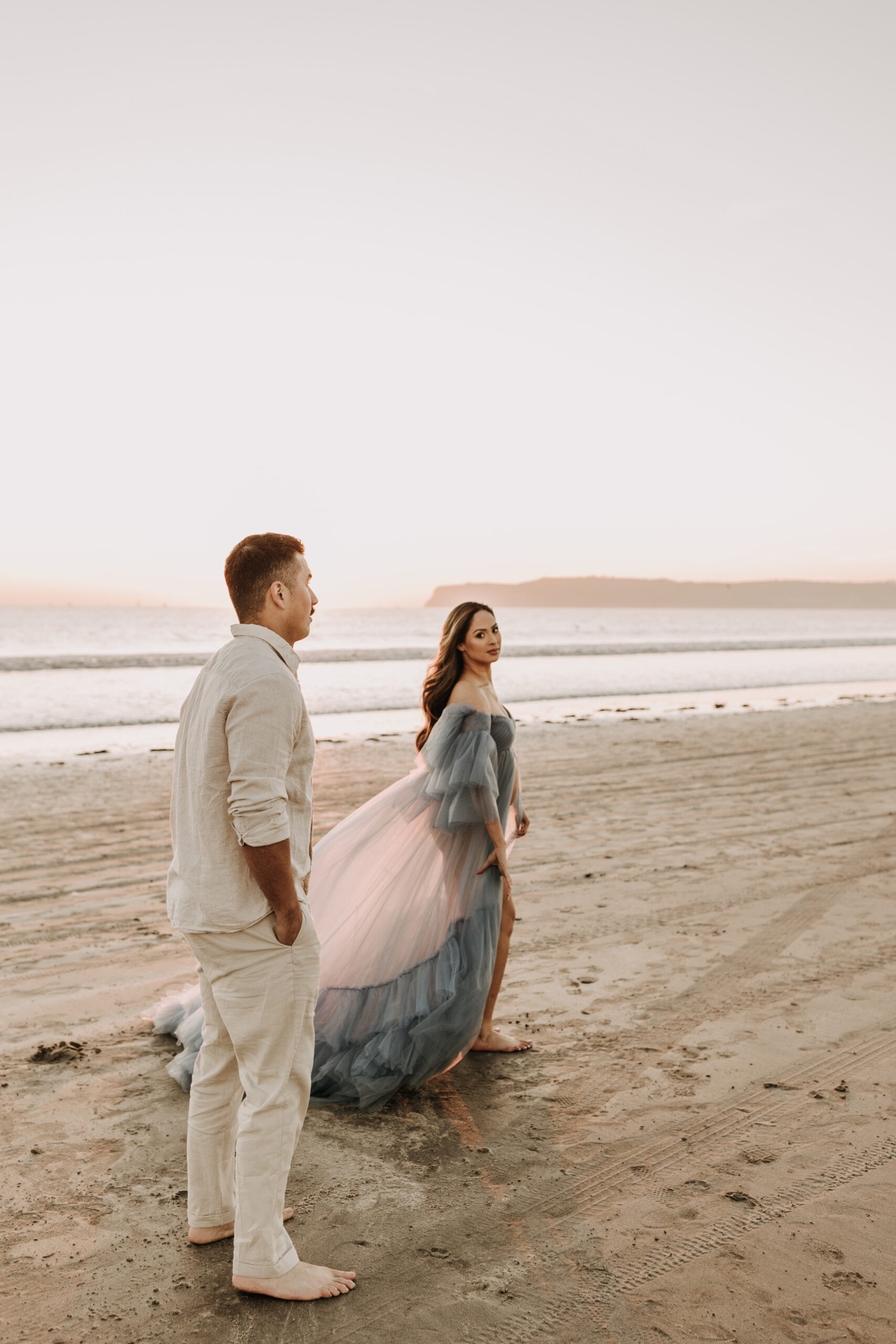 maternity fashion maternity photos beach photos sunset golden hour San Diego maternity photos blue dress pregnancy bright beautiful San Diego family photographer Sabrina kinsealla sabrinalynnphoto