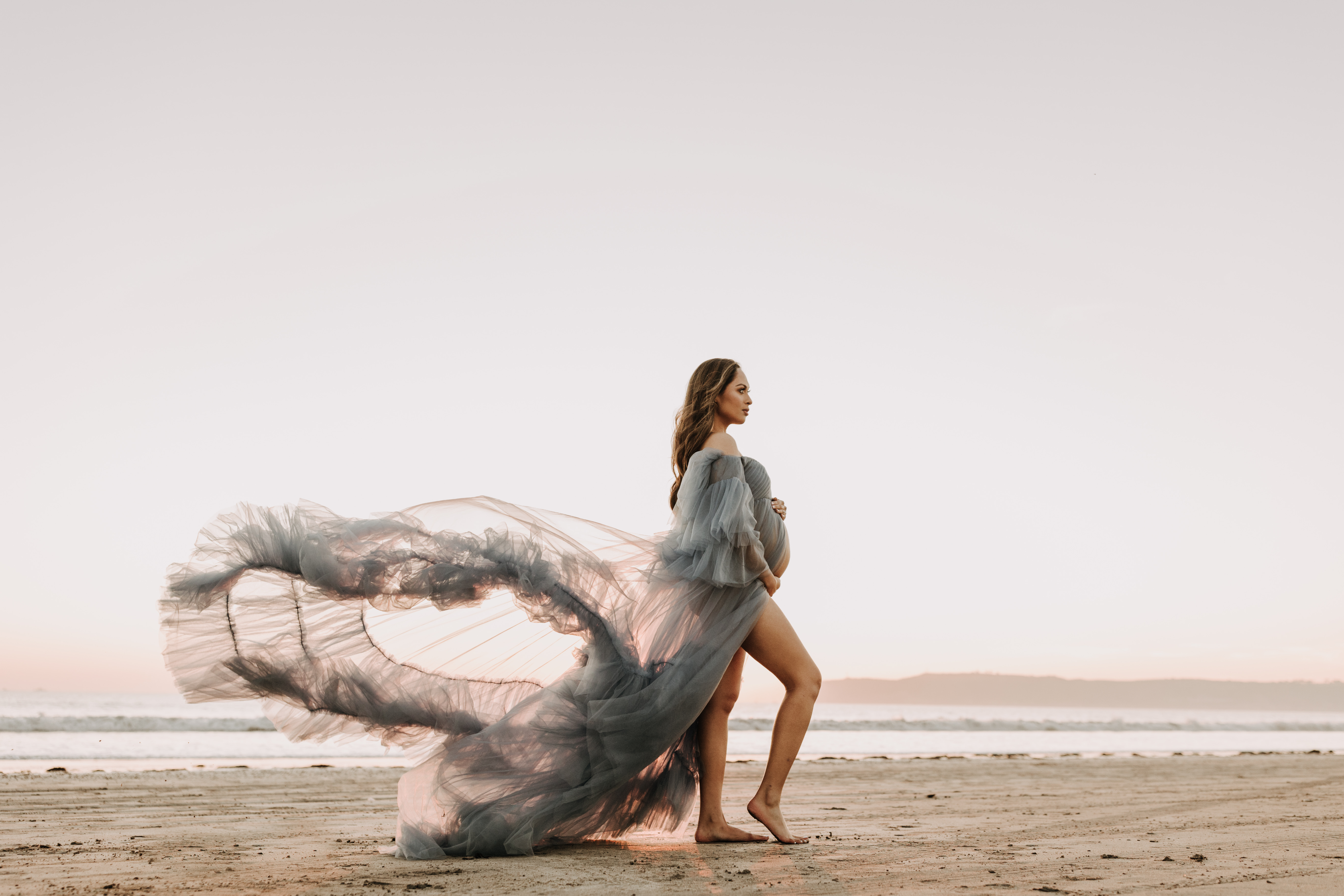 maternity fashion maternity photos beach photos sunset golden hour San Diego maternity photos blue dress pregnancy bright beautiful San Diego family photographer Sabrina kinsealla sabrinalynnphoto