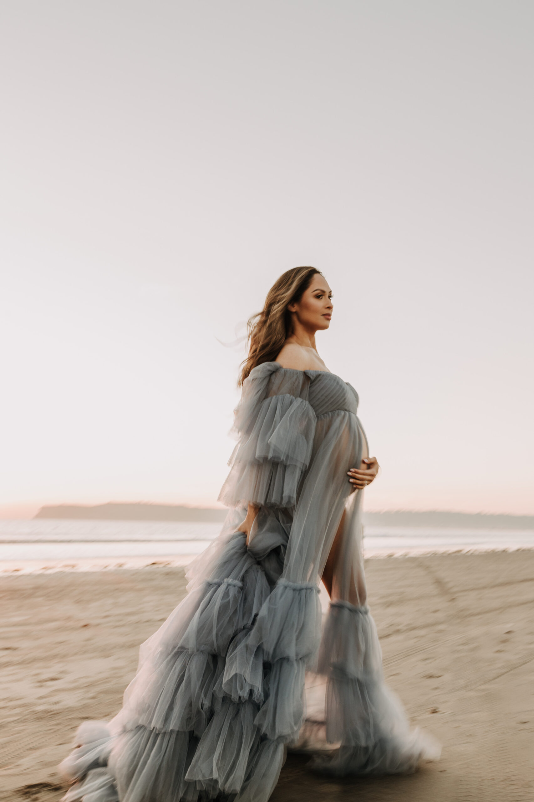 maternity fashion maternity photos beach photos sunset golden hour San Diego maternity photos blue dress pregnancy bright beautiful San Diego family photographer Sabrina kinsealla sabrinalynnphoto