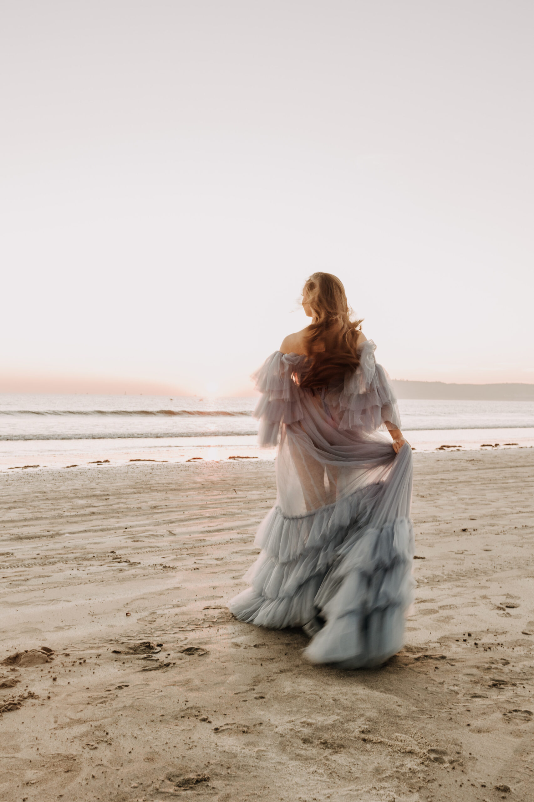 maternity fashion maternity photos beach photos sunset golden hour San Diego maternity photos blue dress pregnancy bright beautiful San Diego family photographer Sabrina kinsealla sabrinalynnphoto