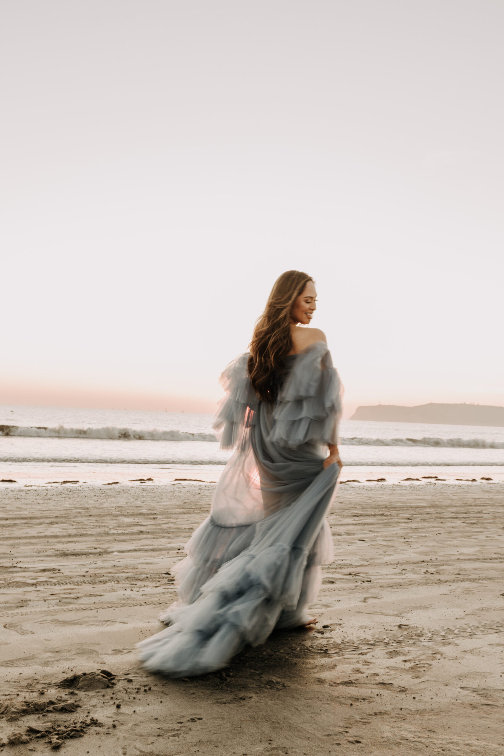 maternity fashion maternity photos beach photos sunset golden hour San Diego maternity photos blue dress pregnancy bright beautiful San Diego family photographer Sabrina kinsealla sabrinalynnphoto