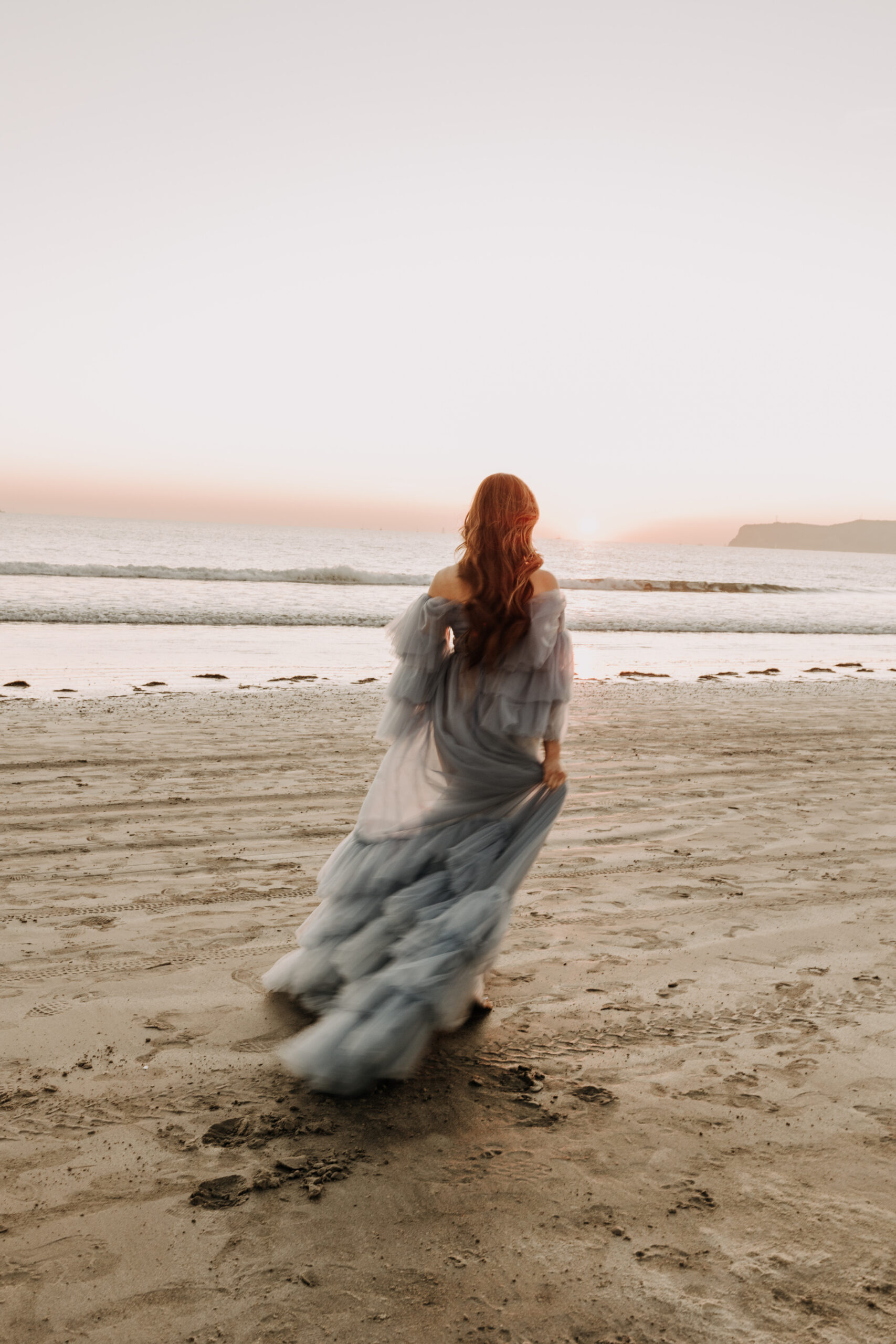 maternity fashion maternity photos beach photos sunset golden hour San Diego maternity photos blue dress pregnancy bright beautiful San Diego family photographer Sabrina kinsealla sabrinalynnphoto