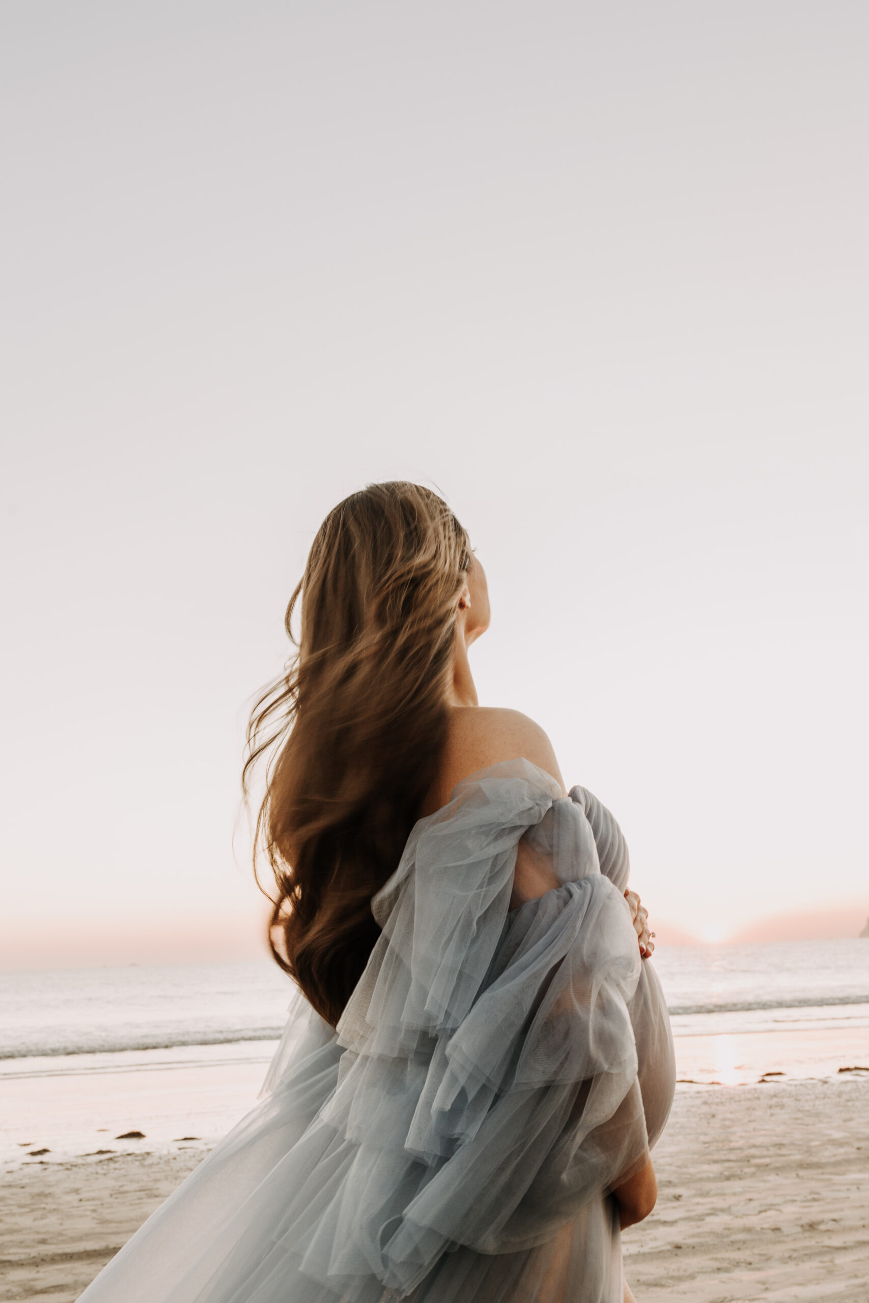 maternity fashion maternity photos beach photos sunset golden hour San Diego maternity photos blue dress pregnancy bright beautiful San Diego family photographer Sabrina kinsealla sabrinalynnphoto