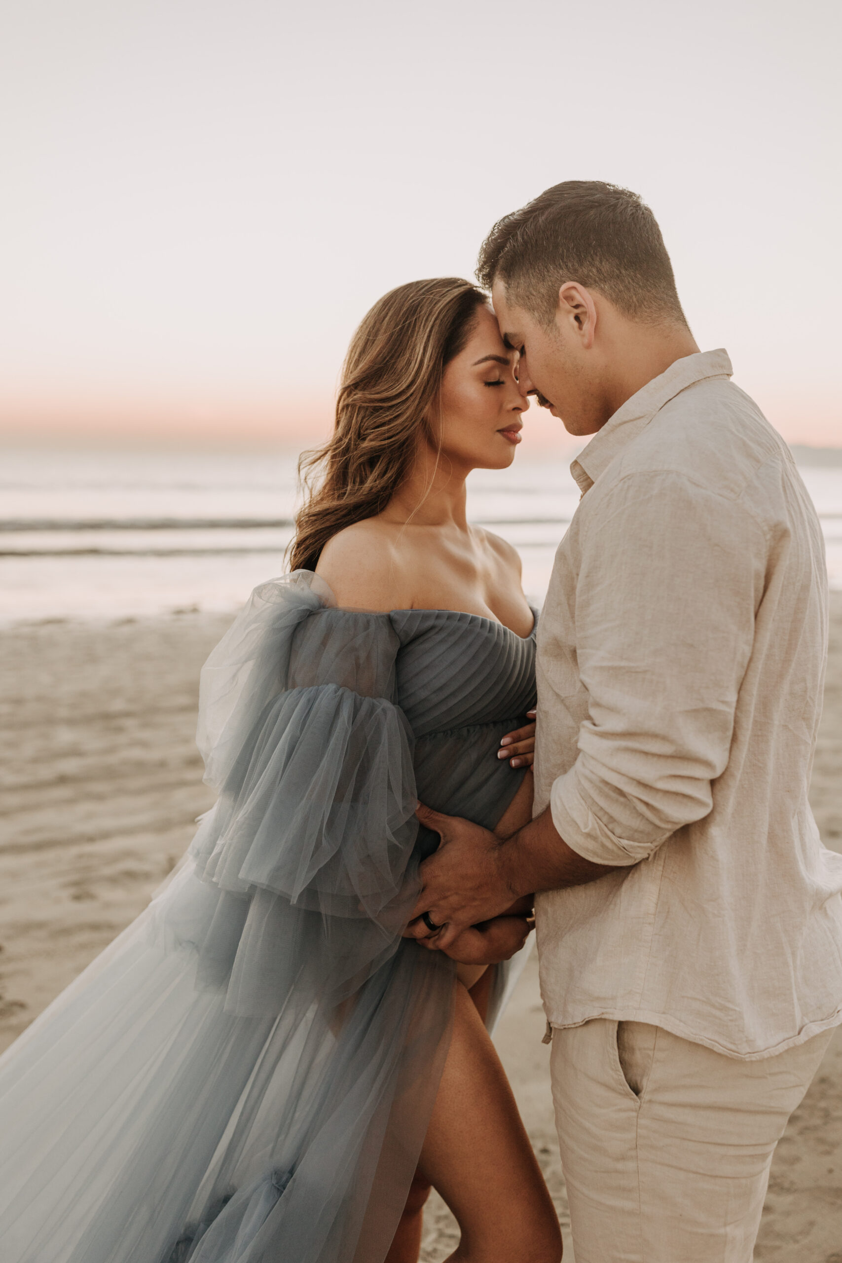 maternity fashion maternity photos beach photos sunset golden hour San Diego maternity photos blue dress pregnancy bright beautiful San Diego family photographer Sabrina kinsealla sabrinalynnphoto