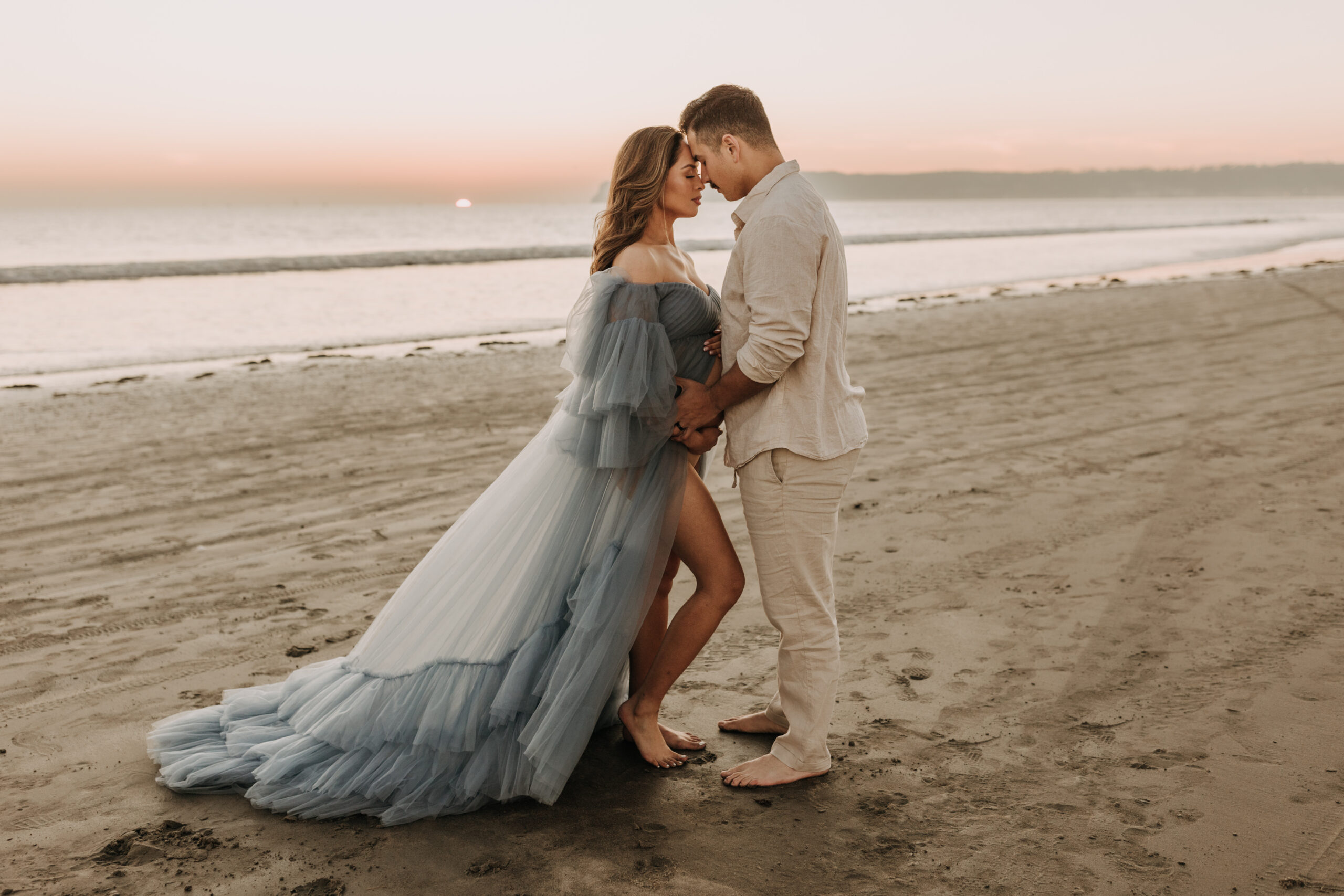 maternity fashion maternity photos beach photos sunset golden hour San Diego maternity photos blue dress pregnancy bright beautiful San Diego family photographer Sabrina kinsealla sabrinalynnphoto