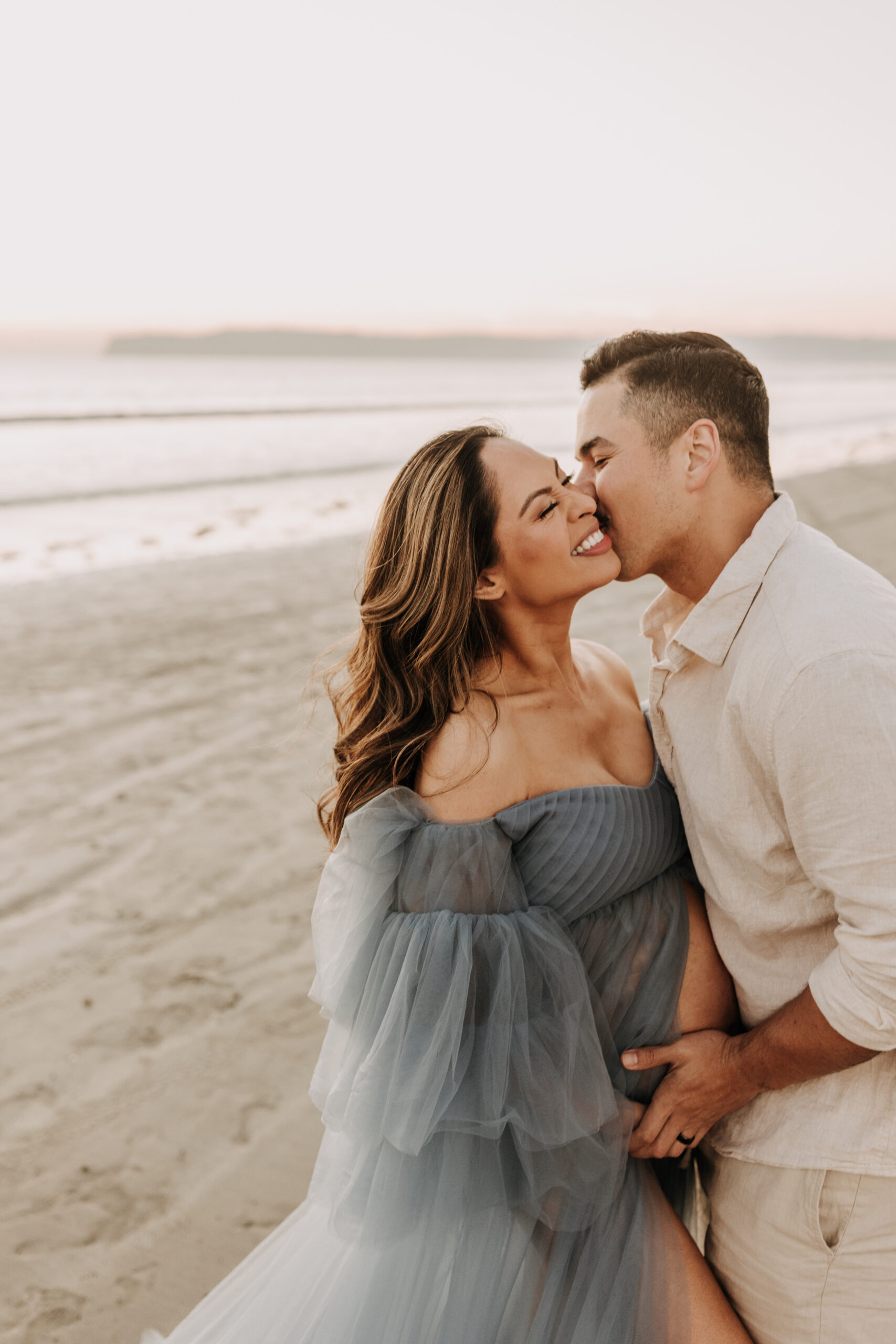 maternity fashion maternity photos beach photos sunset golden hour San Diego maternity photos blue dress pregnancy bright beautiful San Diego family photographer Sabrina kinsealla sabrinalynnphoto