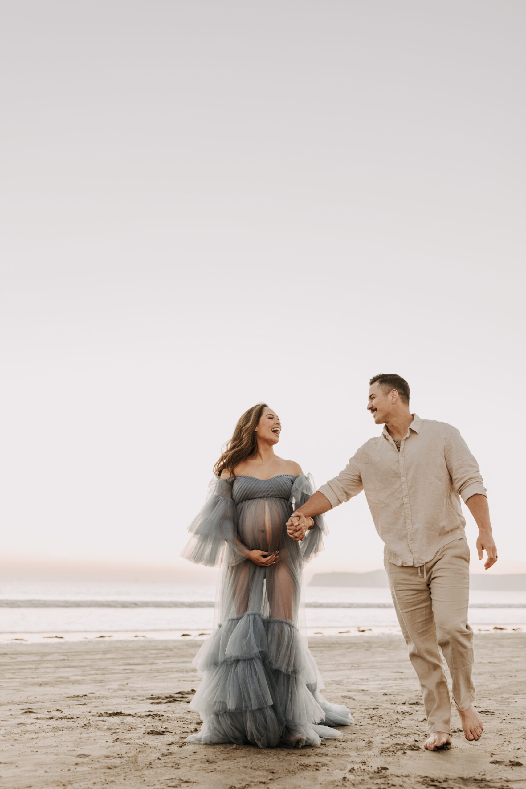 maternity fashion maternity photos beach photos sunset golden hour San Diego maternity photos blue dress pregnancy bright beautiful San Diego family photographer Sabrina kinsealla sabrinalynnphoto