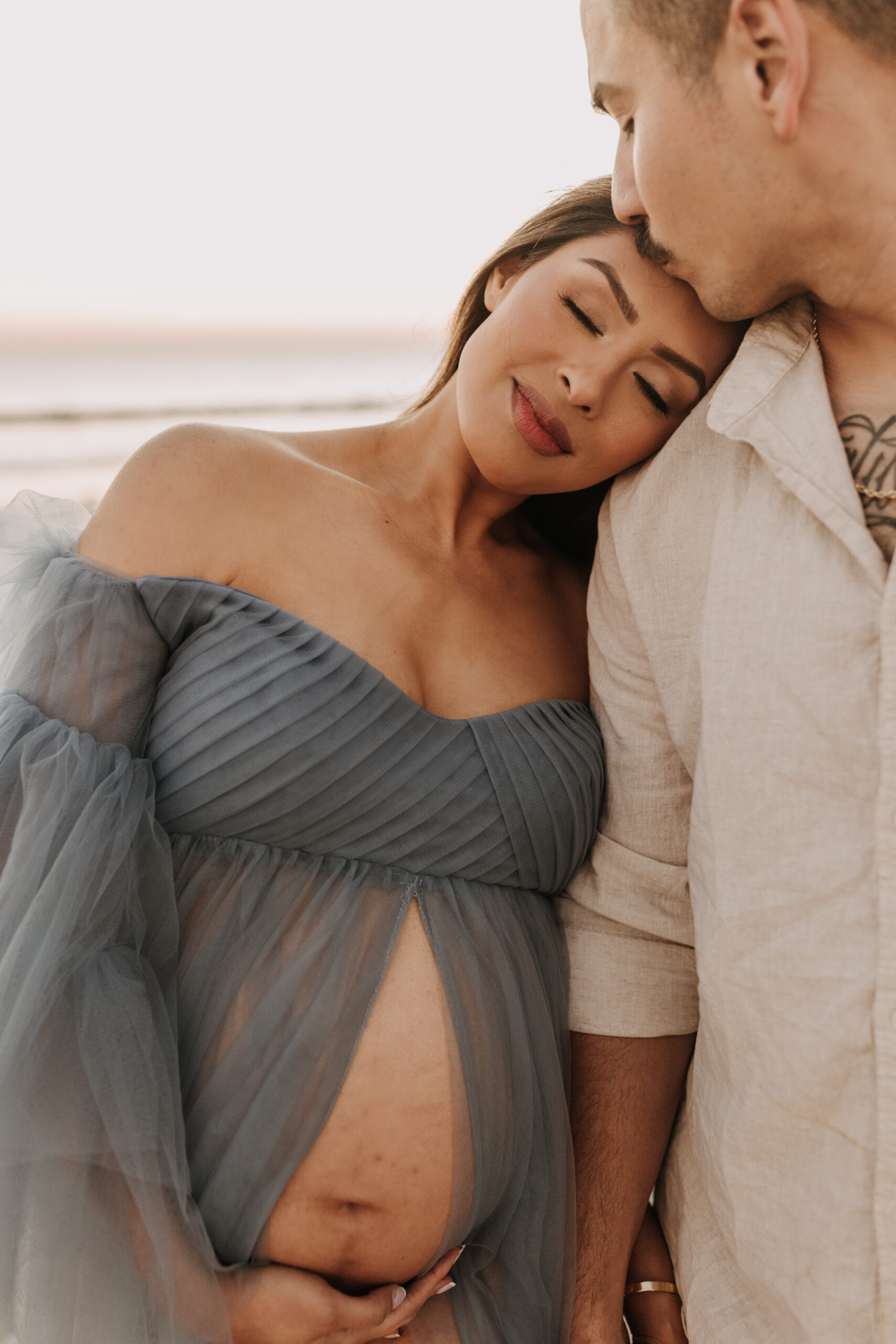 maternity fashion maternity photos beach photos sunset golden hour San Diego maternity photos blue dress pregnancy bright beautiful San Diego family photographer Sabrina kinsealla sabrinalynnphoto