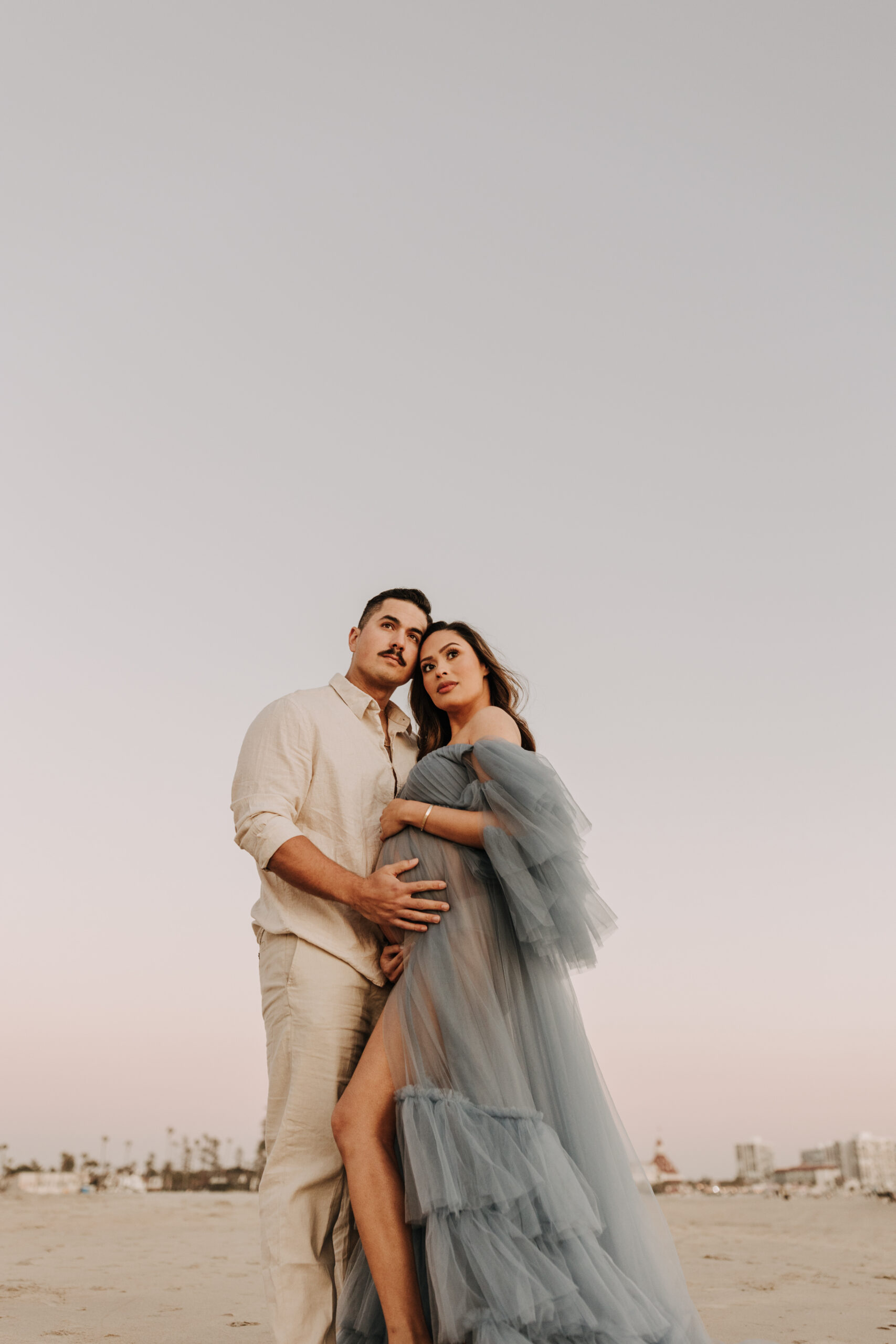 maternity fashion maternity photos beach photos sunset golden hour San Diego maternity photos blue dress pregnancy bright beautiful San Diego family photographer Sabrina kinsealla sabrinalynnphoto