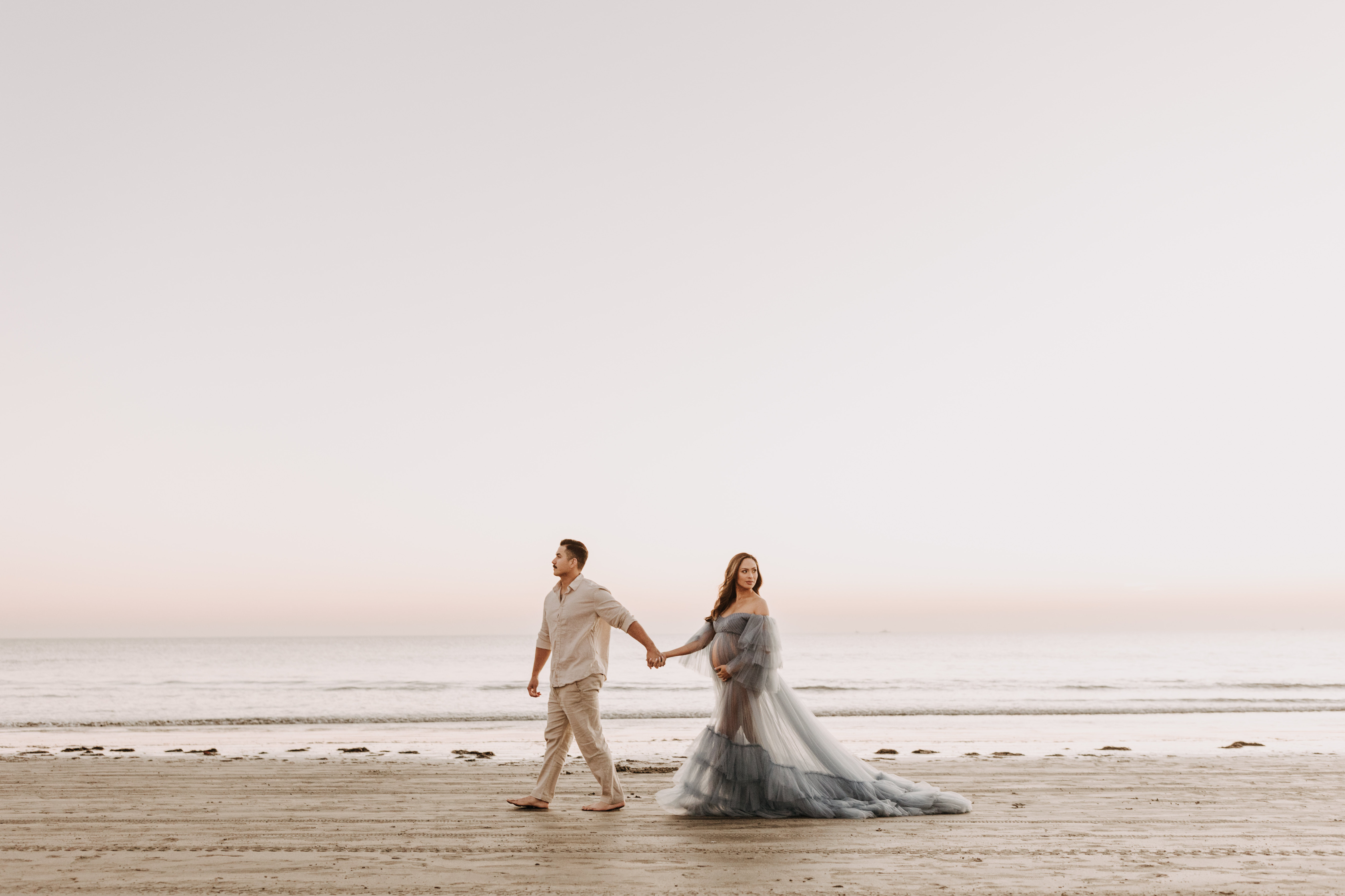 maternity fashion maternity photos beach photos sunset golden hour San Diego maternity photos blue dress pregnancy bright beautiful San Diego family photographer Sabrina kinsealla sabrinalynnphoto