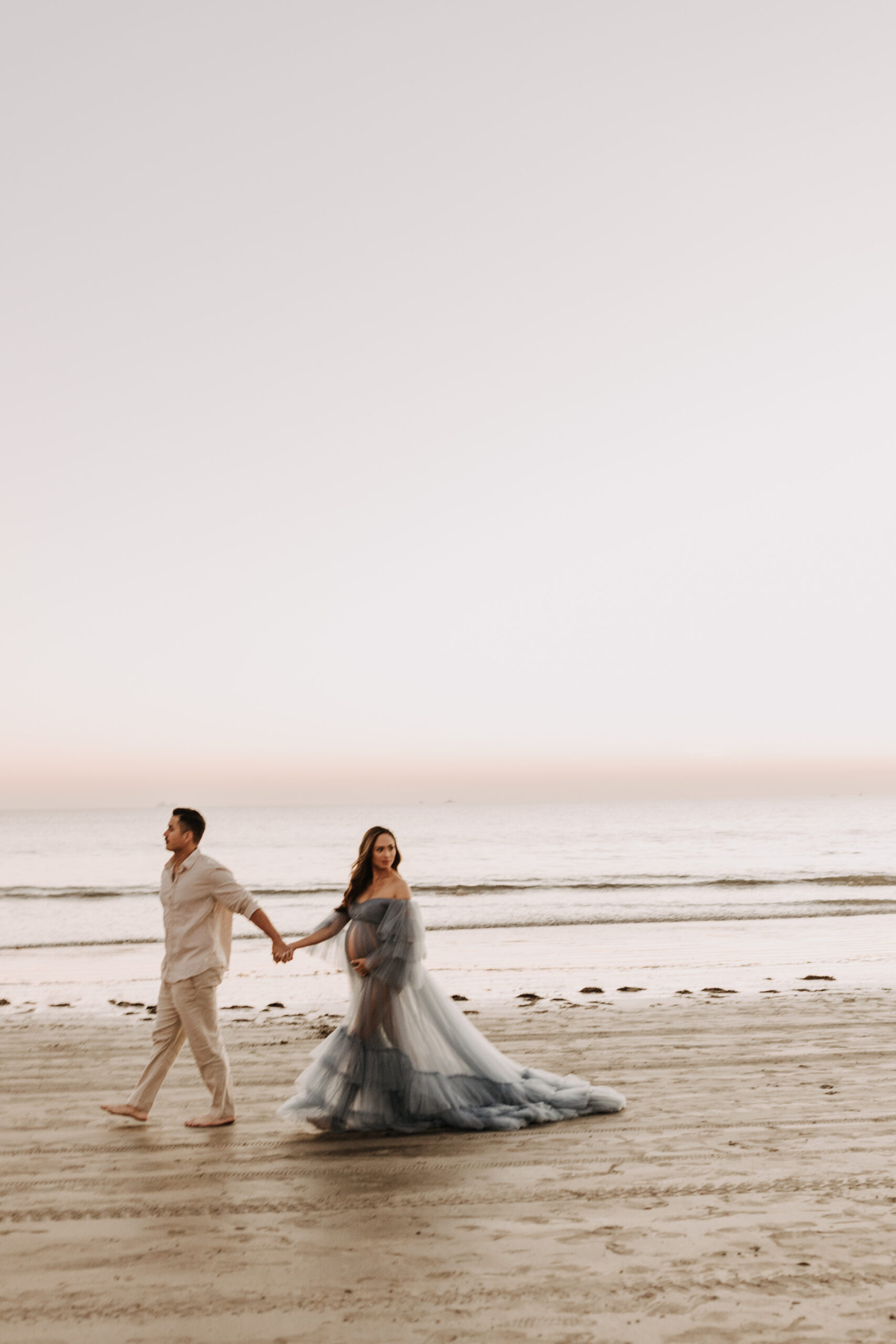 maternity fashion maternity photos beach photos sunset golden hour San Diego maternity photos blue dress pregnancy bright beautiful San Diego family photographer Sabrina kinsealla sabrinalynnphoto