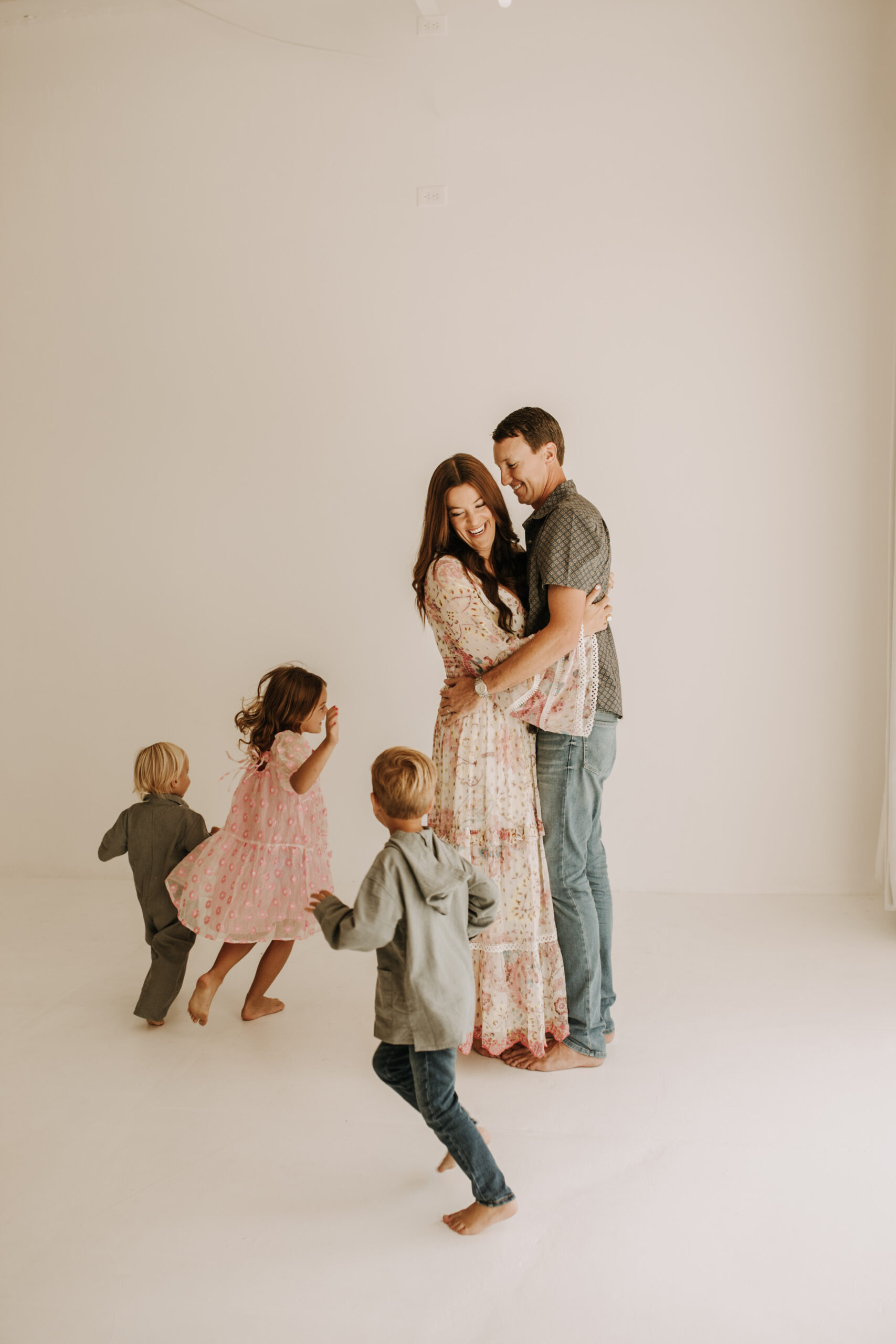 studio indoor family session warm neutrals modern themed family photos candid family photos in studio San Diego family photographer Sabrina kinsella sabrinalynnphoto