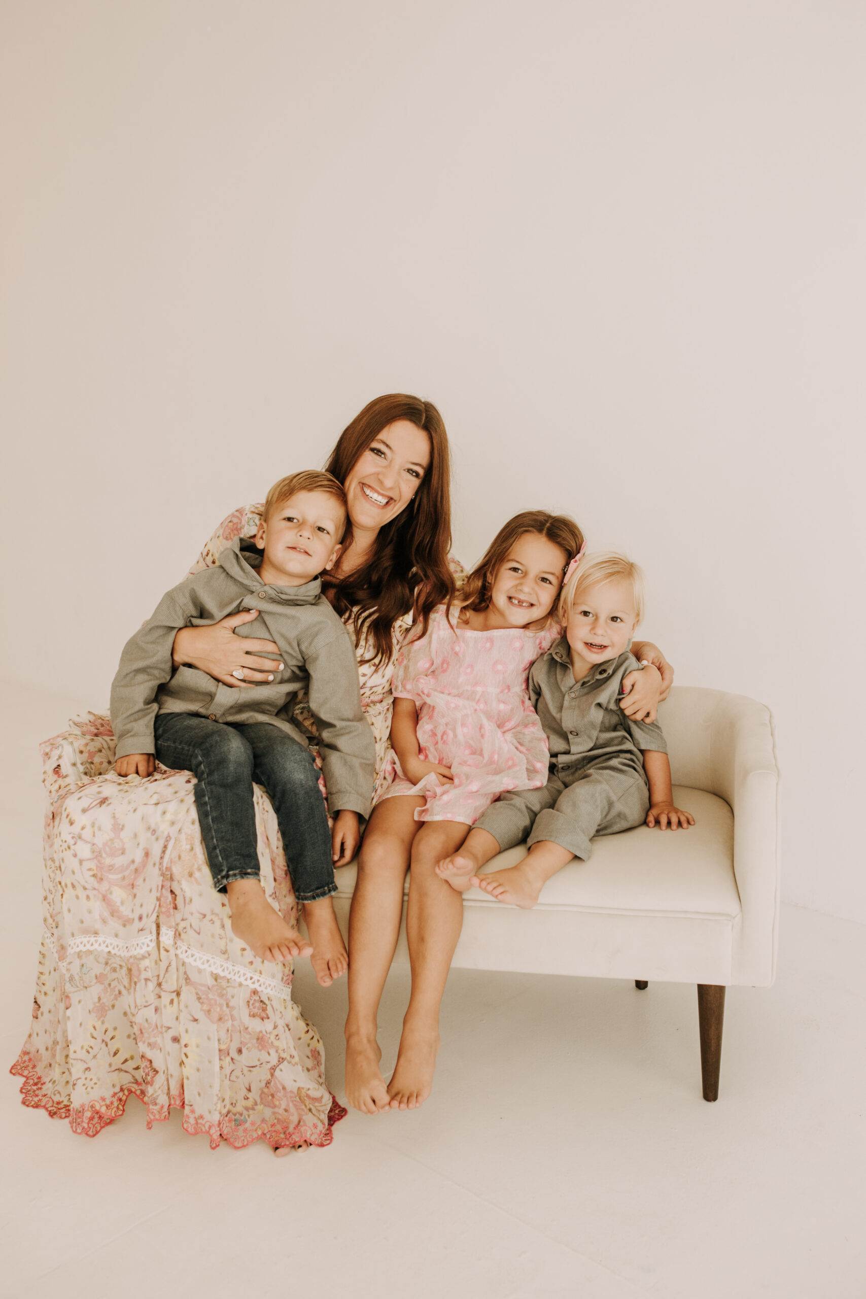 studio indoor family session warm neutrals modern themed family photos candid family photos in studio San Diego family photographer Sabrina kinsella sabrinalynnphoto