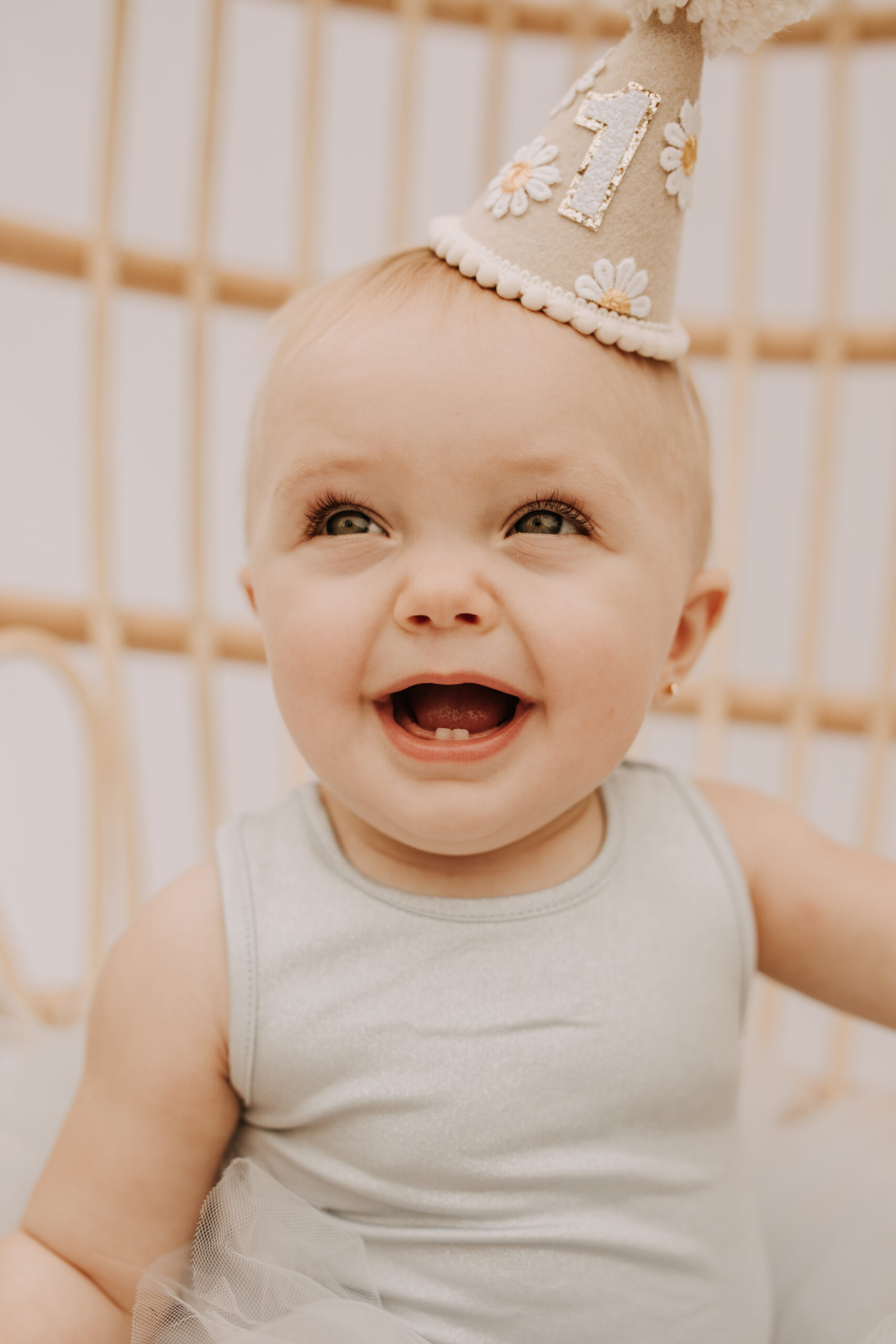 springtime soft light daisies mama and me mom and baby white dress white backdrop flower crown motherhood photos motherhood photography San Diego maternity photographer family photographer Sabrina kinsella outdoor photos green trees backyard mini session