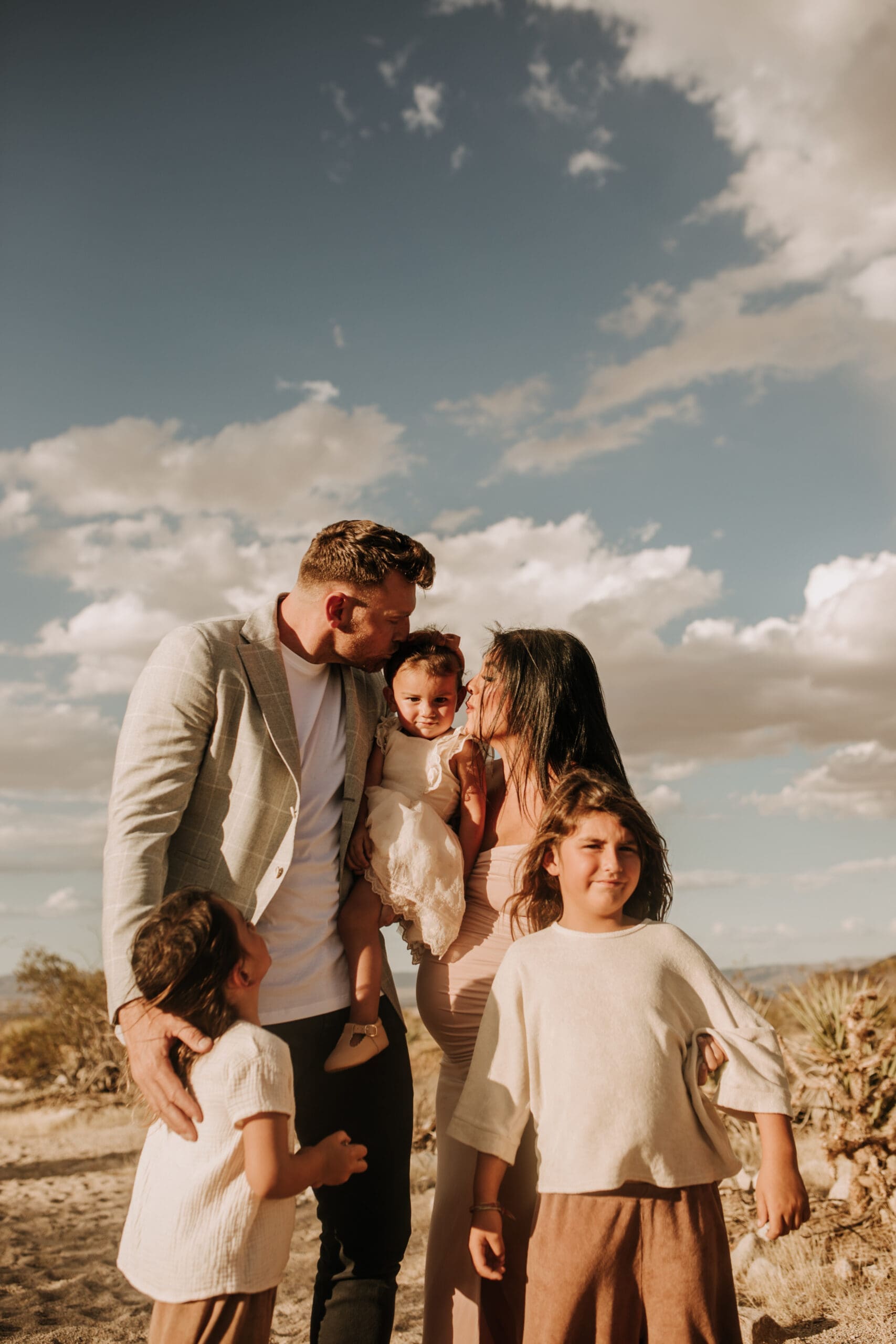 Joshua Tree national park warm neutral toned outdoor family photos maternity photography maternity fashion family of five San Diego family photographer Sabrina kinsella