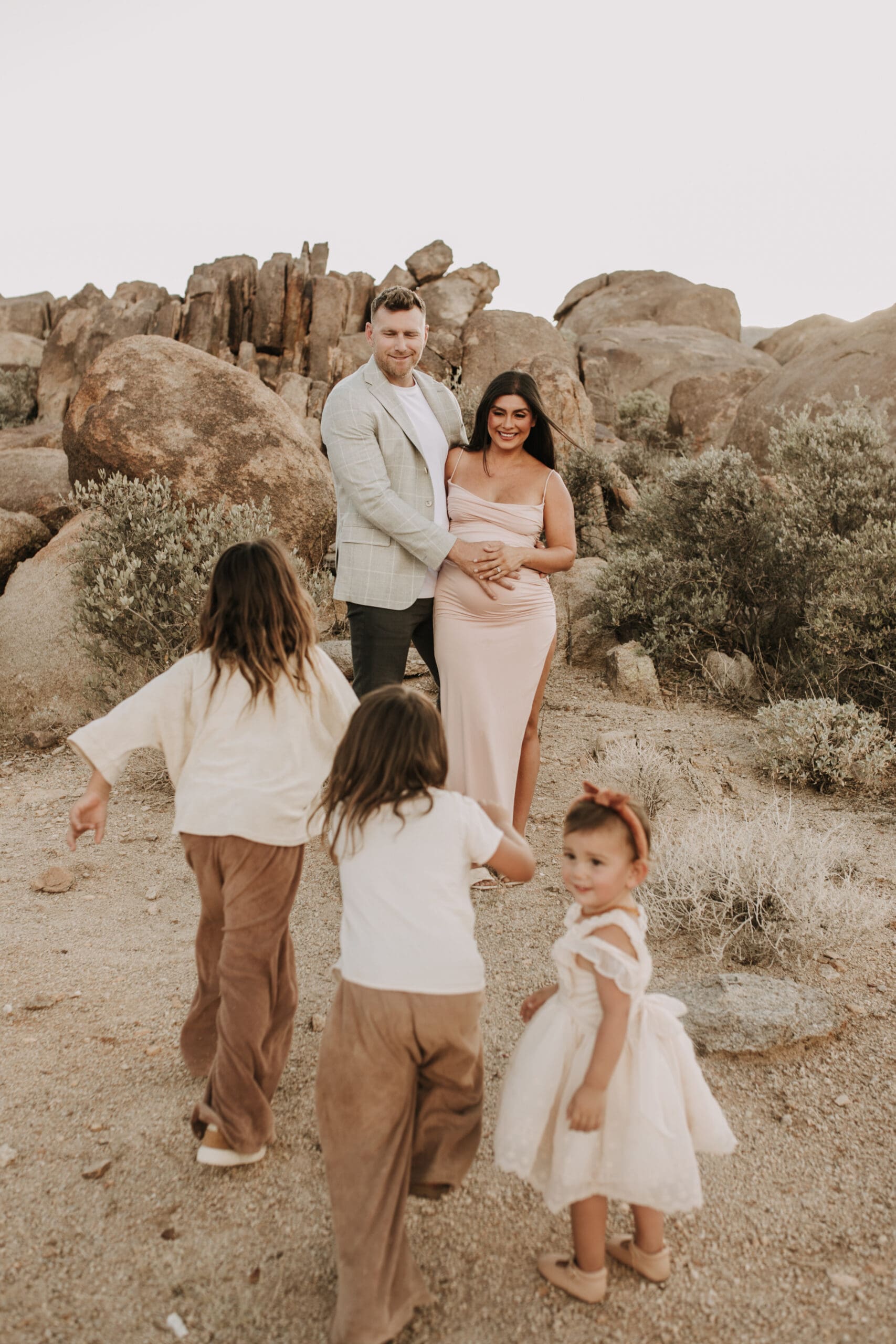 Joshua Tree national park warm neutral toned outdoor family photos maternity photography maternity fashion family of five San Diego family photographer Sabrina kinsella