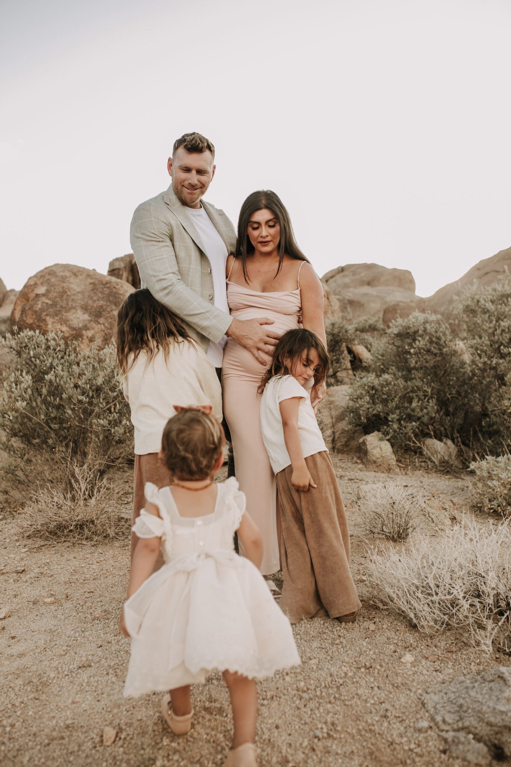 Joshua Tree national park warm neutral toned outdoor family photos maternity photography maternity fashion family of five San Diego family photographer Sabrina kinsella