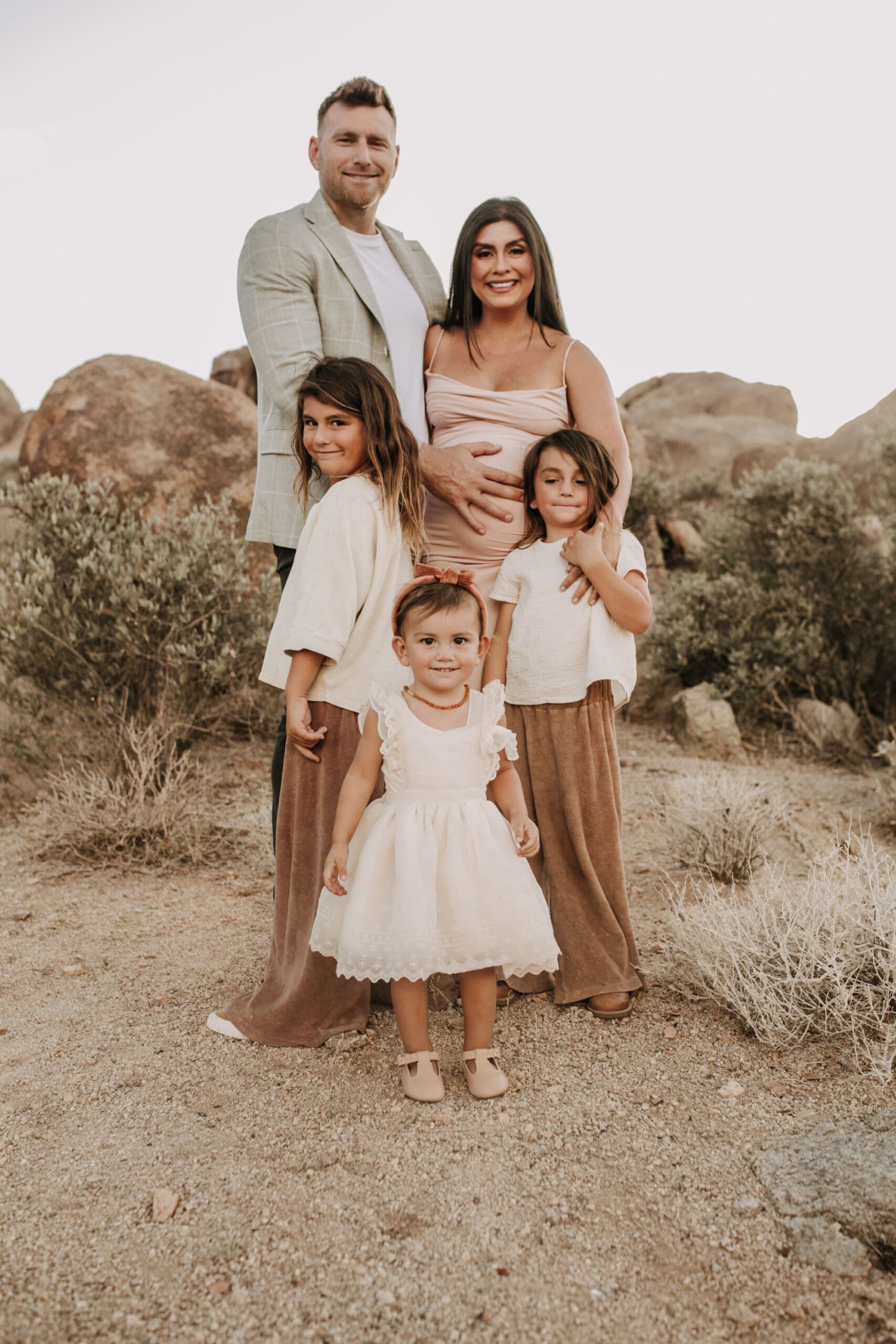 Joshua Tree national park warm neutral toned outdoor family photos maternity photography maternity fashion family of five San Diego family photographer Sabrina kinsella