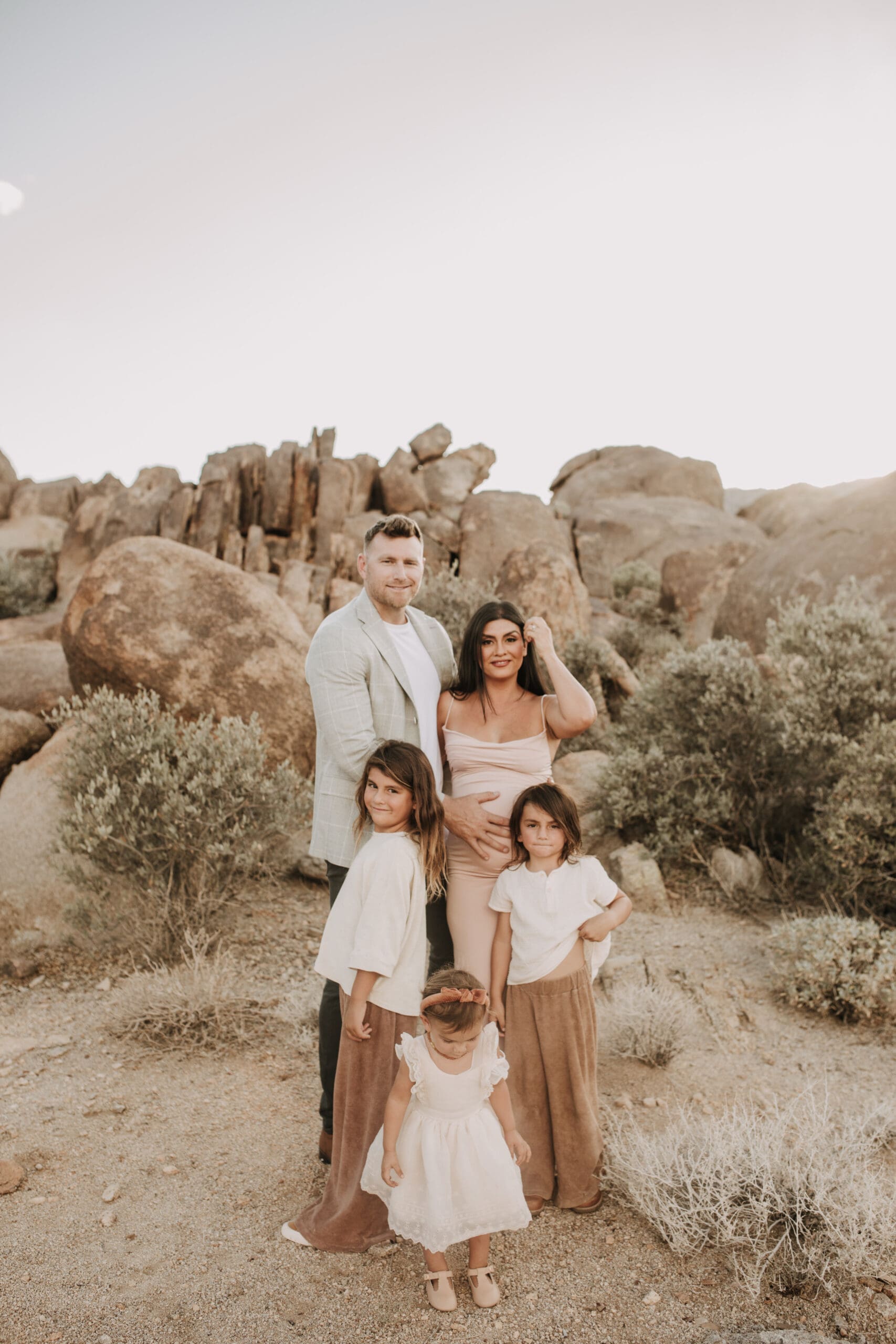 Joshua Tree national park warm neutral toned outdoor family photos maternity photography maternity fashion family of five San Diego family photographer Sabrina kinsella