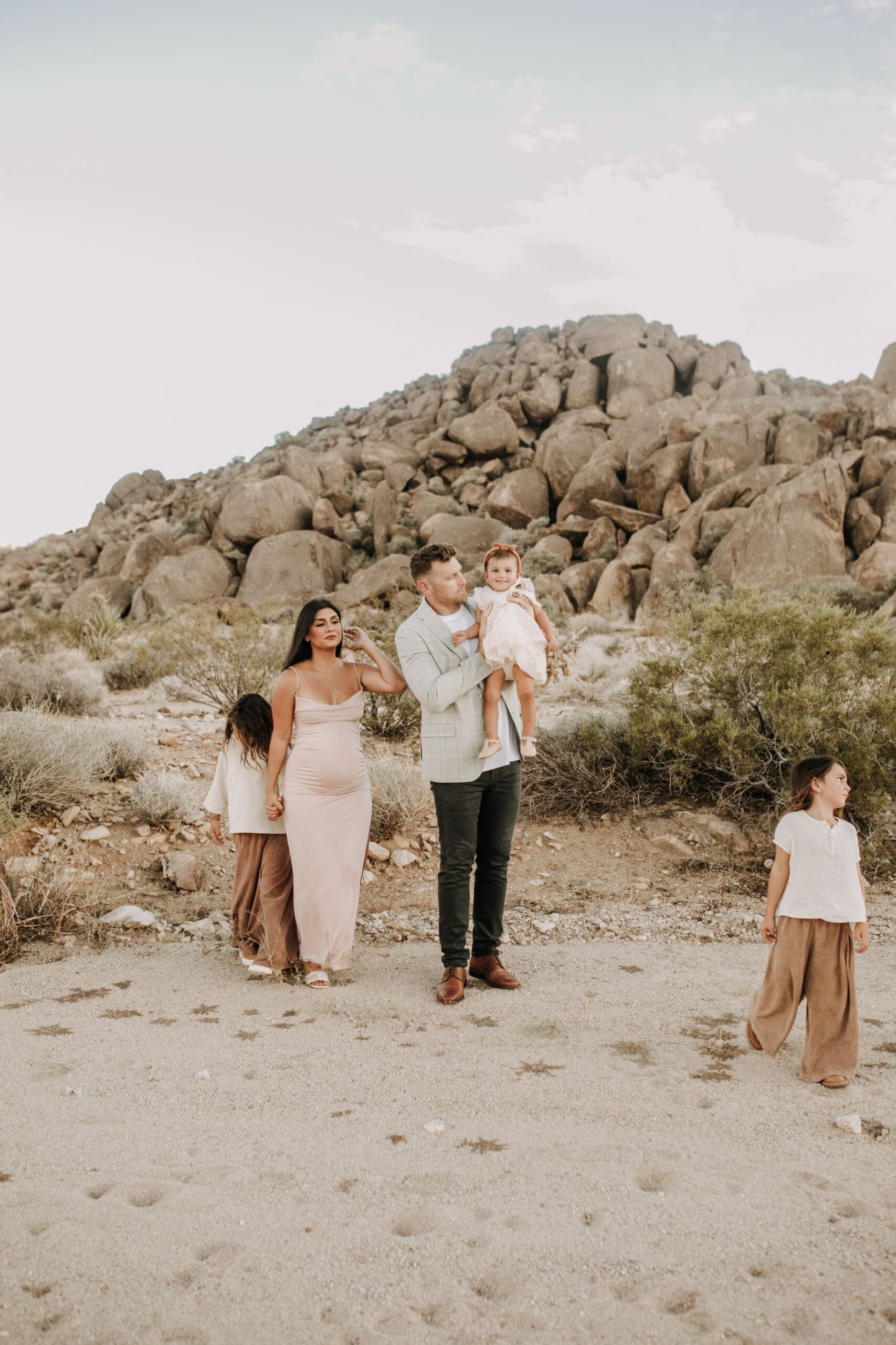 Joshua Tree national park warm neutral toned outdoor family photos maternity photography maternity fashion family of five San Diego family photographer Sabrina kinsella