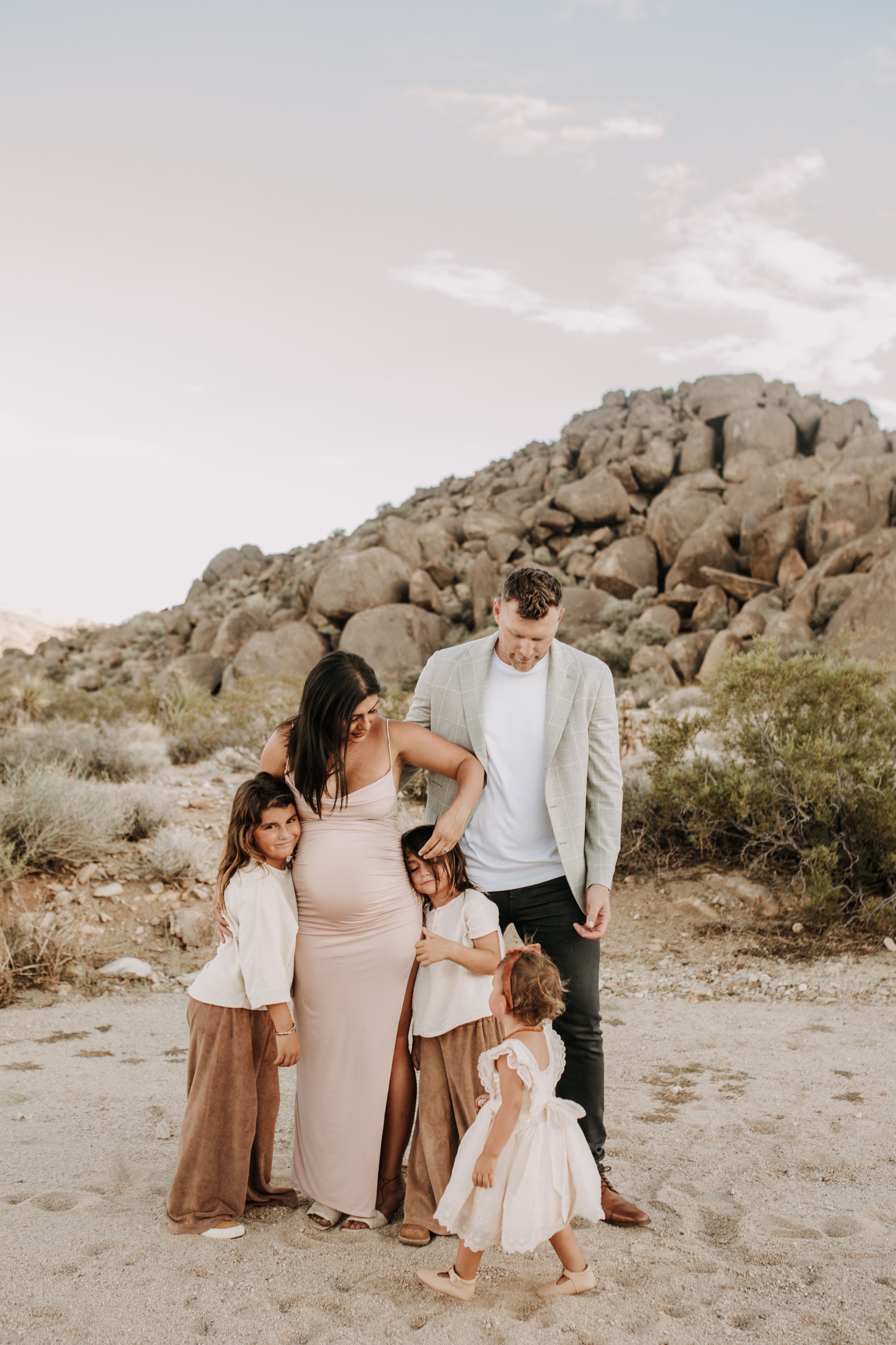 Joshua Tree national park warm neutral toned outdoor family photos maternity photography maternity fashion family of five San Diego family photographer Sabrina kinsella 