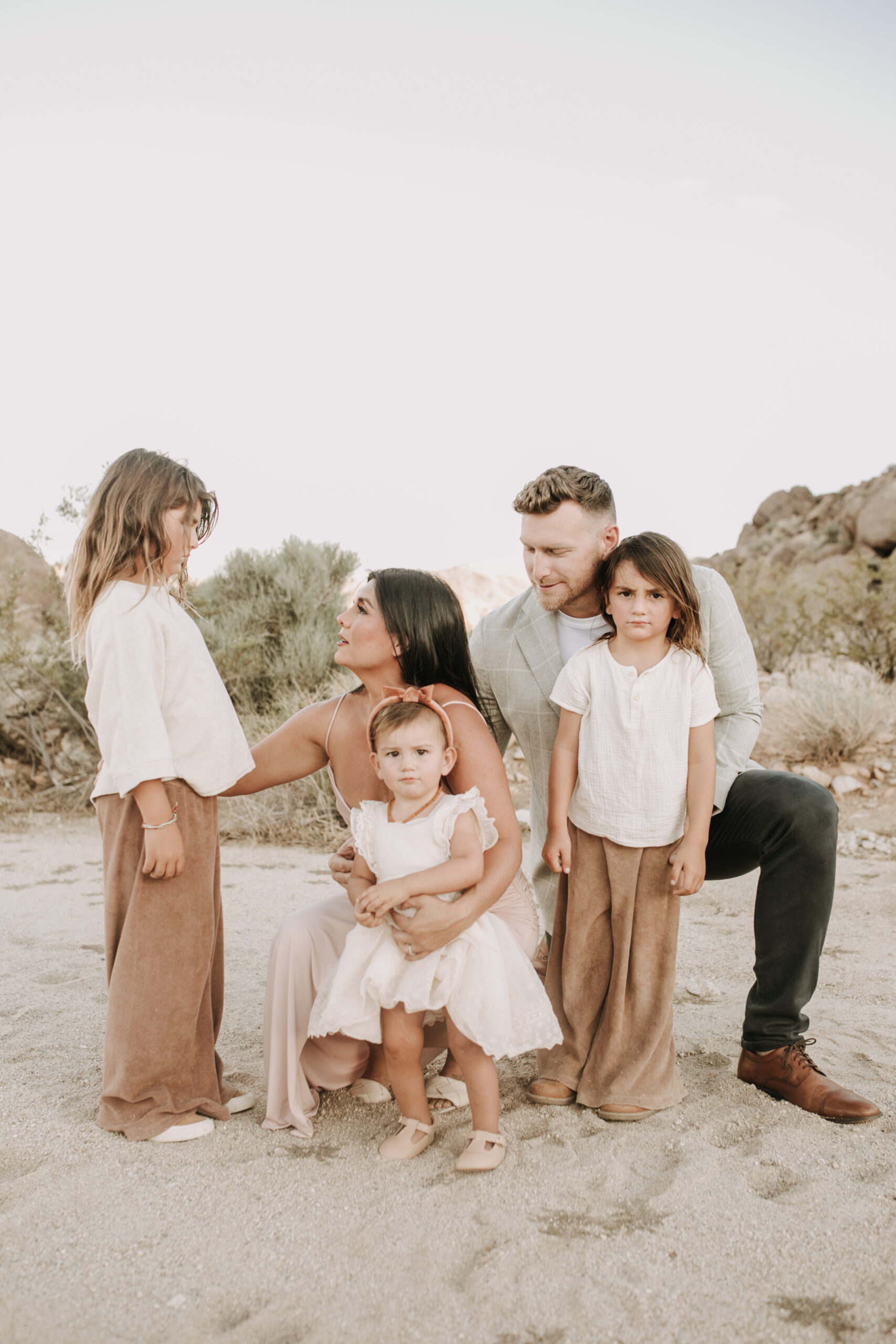 Joshua Tree national park warm neutral toned outdoor family photos maternity photography maternity fashion family of five San Diego family photographer Sabrina kinsella