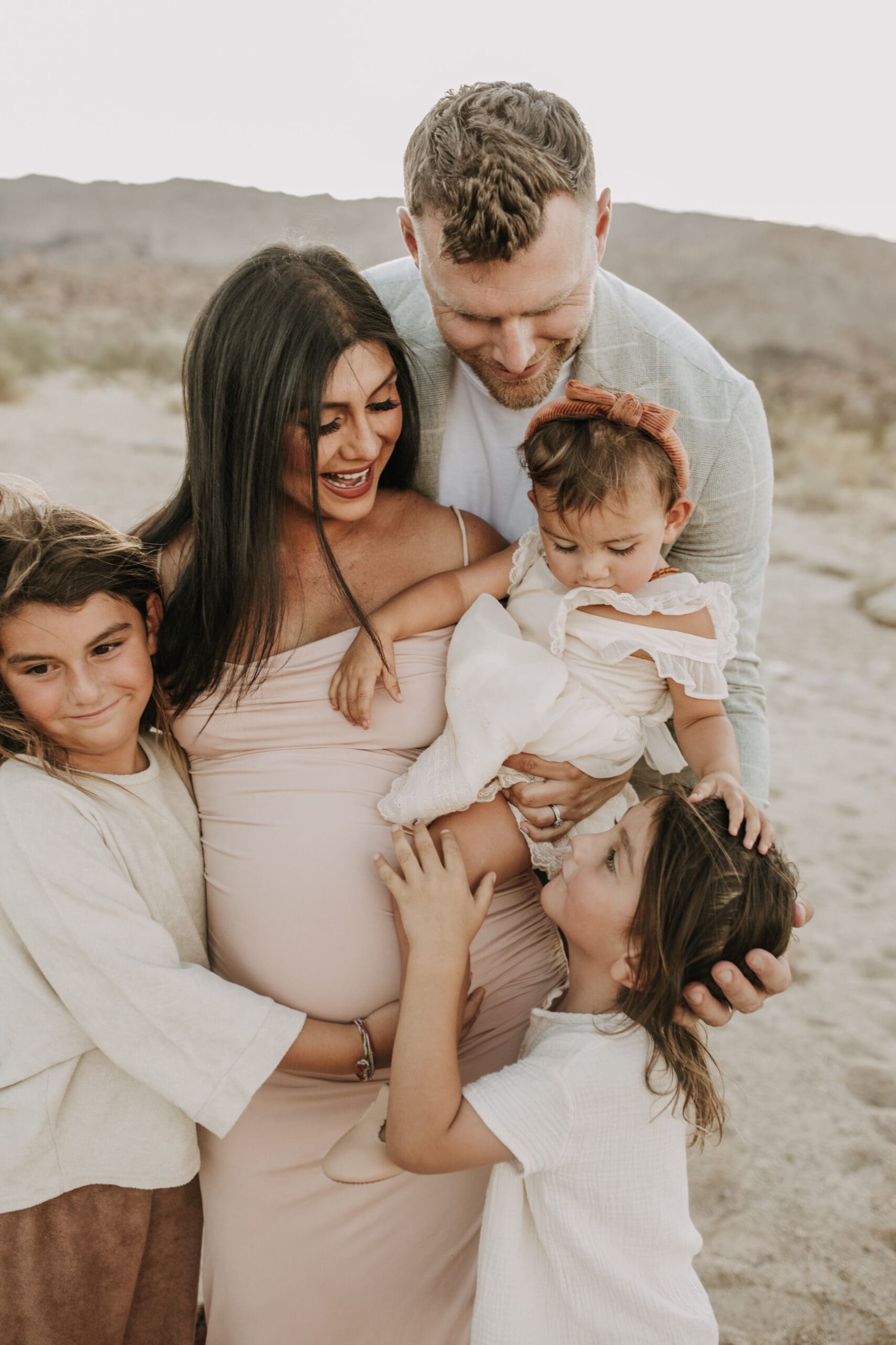 Joshua Tree national park warm neutral toned outdoor family photos maternity photography maternity fashion family of five San Diego family photographer Sabrina kinsella