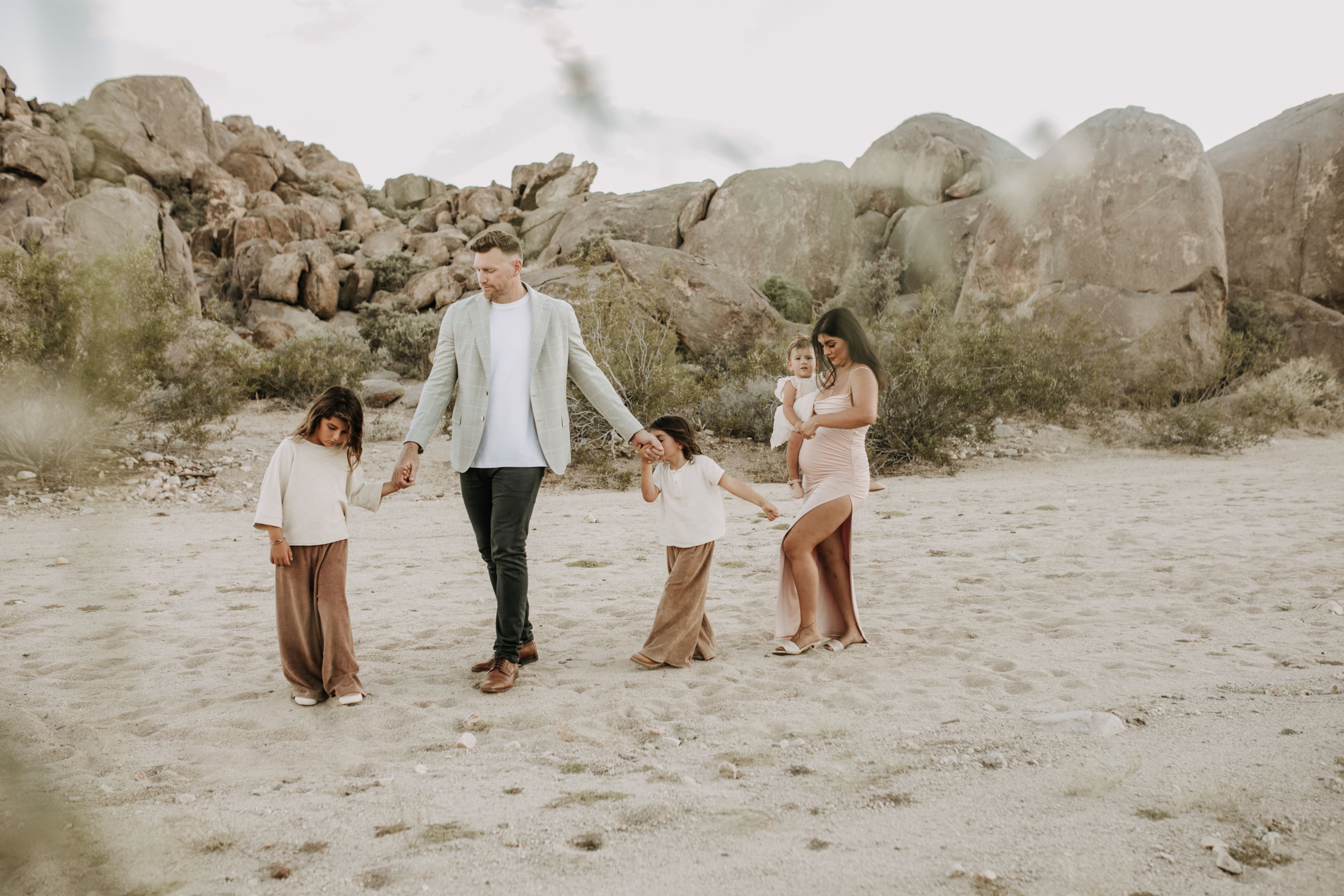 Joshua Tree national park warm neutral toned outdoor family photos maternity photography maternity fashion family of five San Diego family photographer Sabrina kinsella 