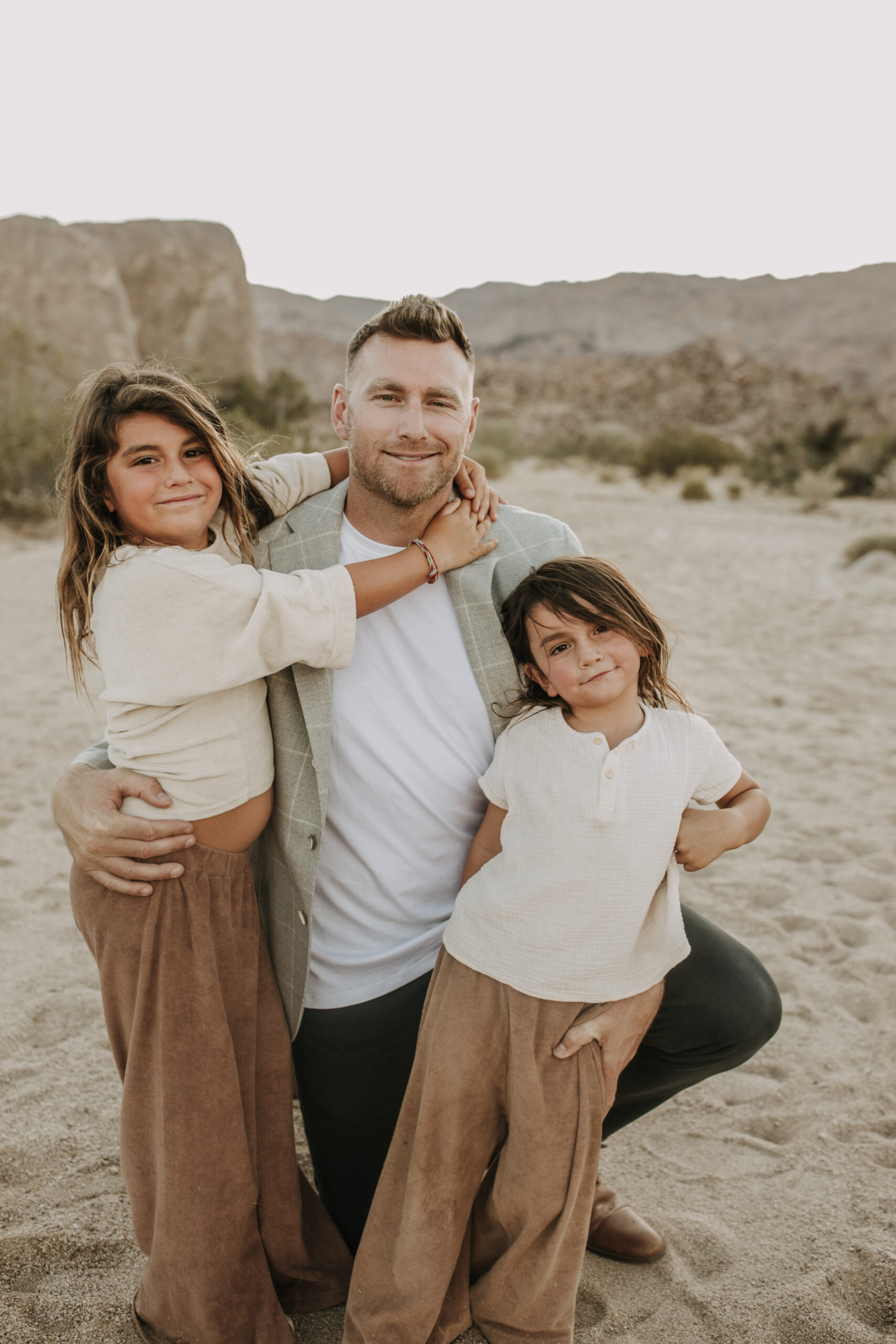 Joshua Tree national park warm neutral toned outdoor family photos maternity photography maternity fashion family of five San Diego family photographer Sabrina kinsella