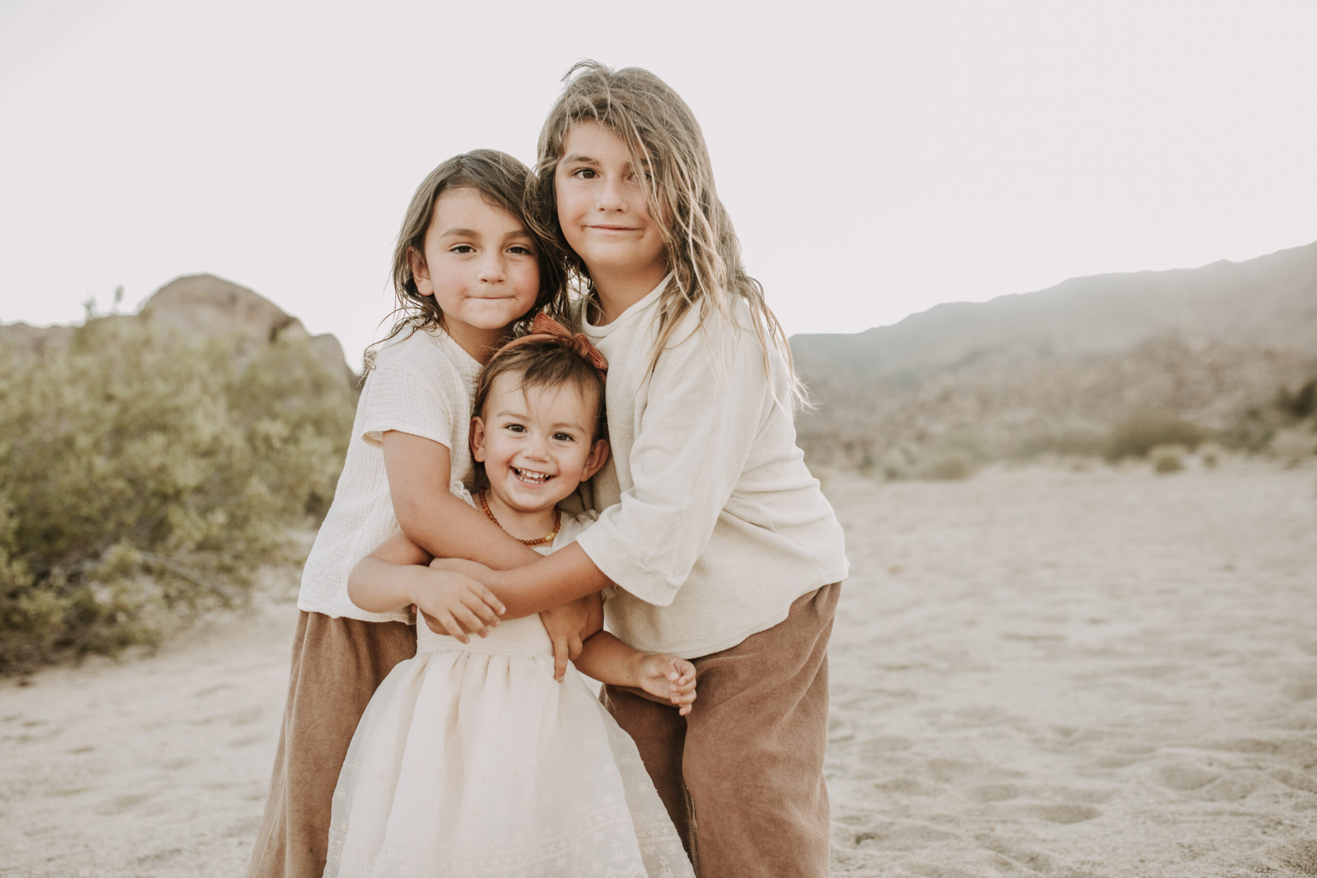 Joshua Tree national park warm neutral toned outdoor family photos maternity photography maternity fashion family of five San Diego family photographer Sabrina kinsella