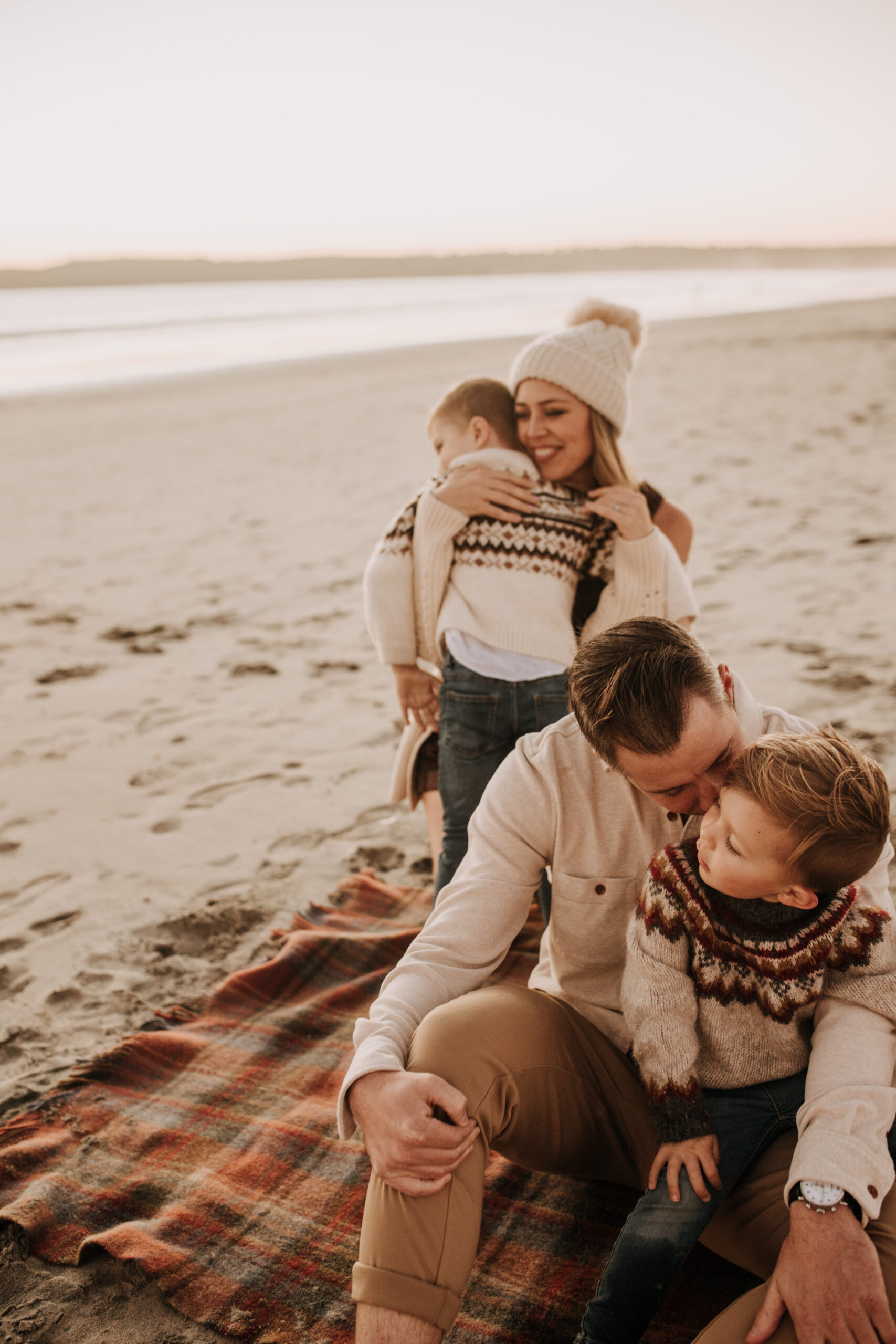 San Diego family photos warm sunset beach photos family of four candid family moments golden hour light beach San Diego family photographer Sabrina Kinsella