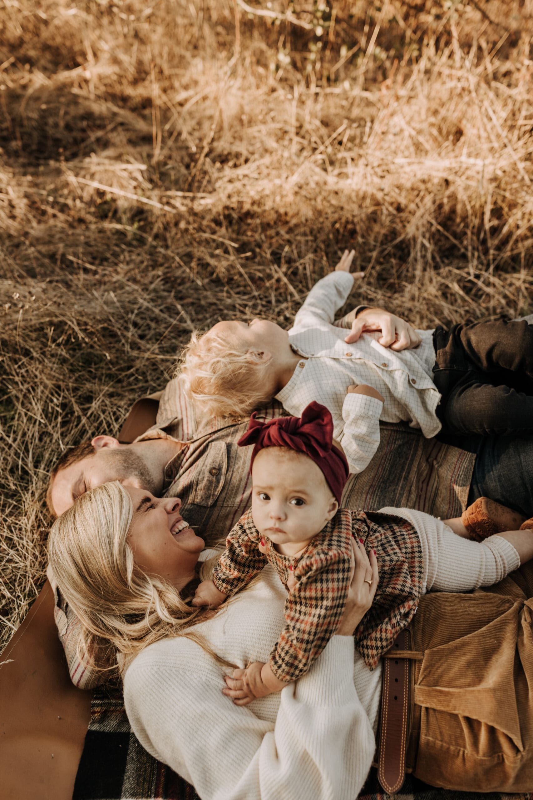 warm toned fall outdoor family photos candid family photos family of four brown colors outdoor San Diego family photographer Sabrina kinsella sabrinalynnphoto