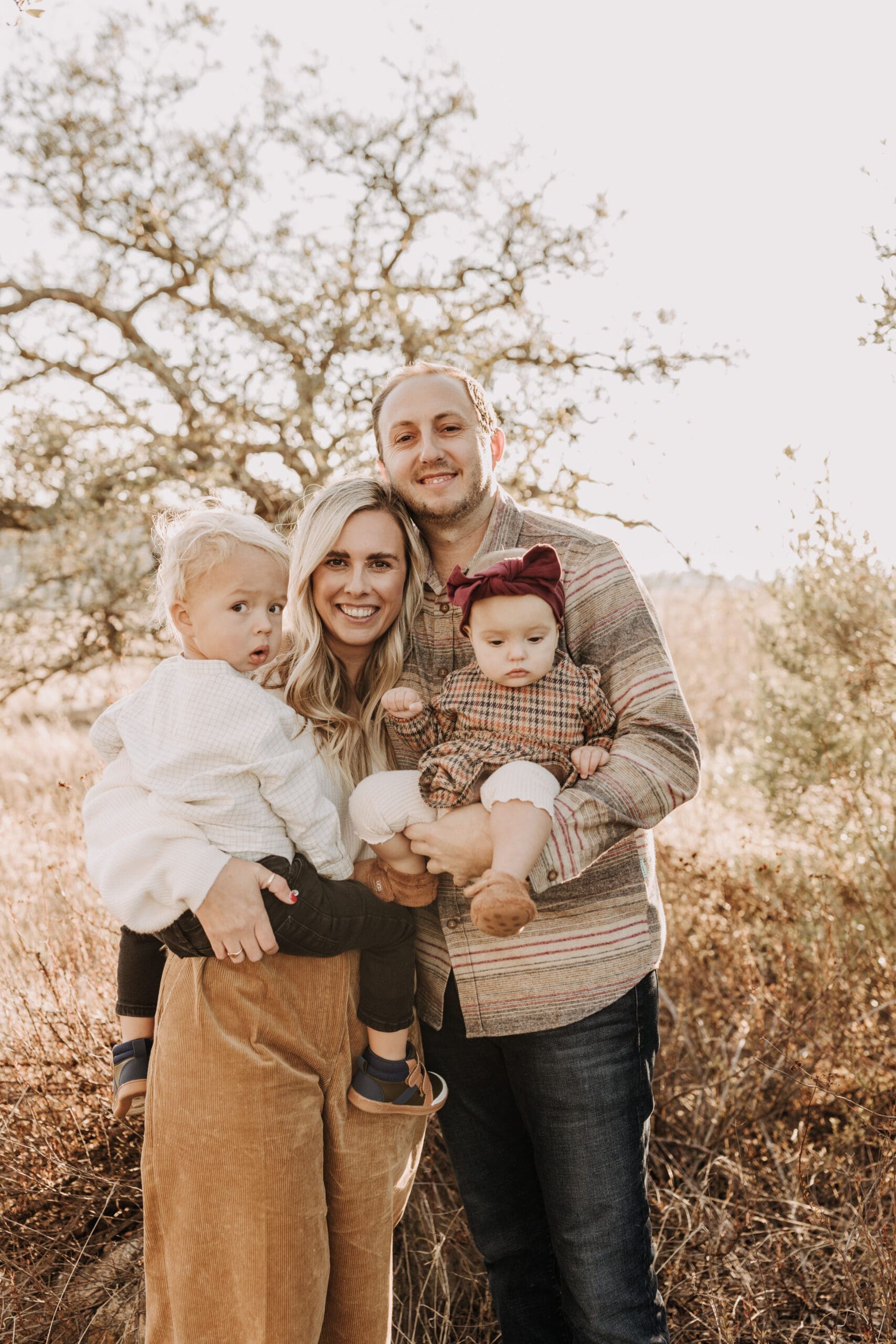 warm toned fall outdoor family photos candid family photos family of four brown colors outdoor San Diego family photographer Sabrina kinsella sabrinalynnphoto