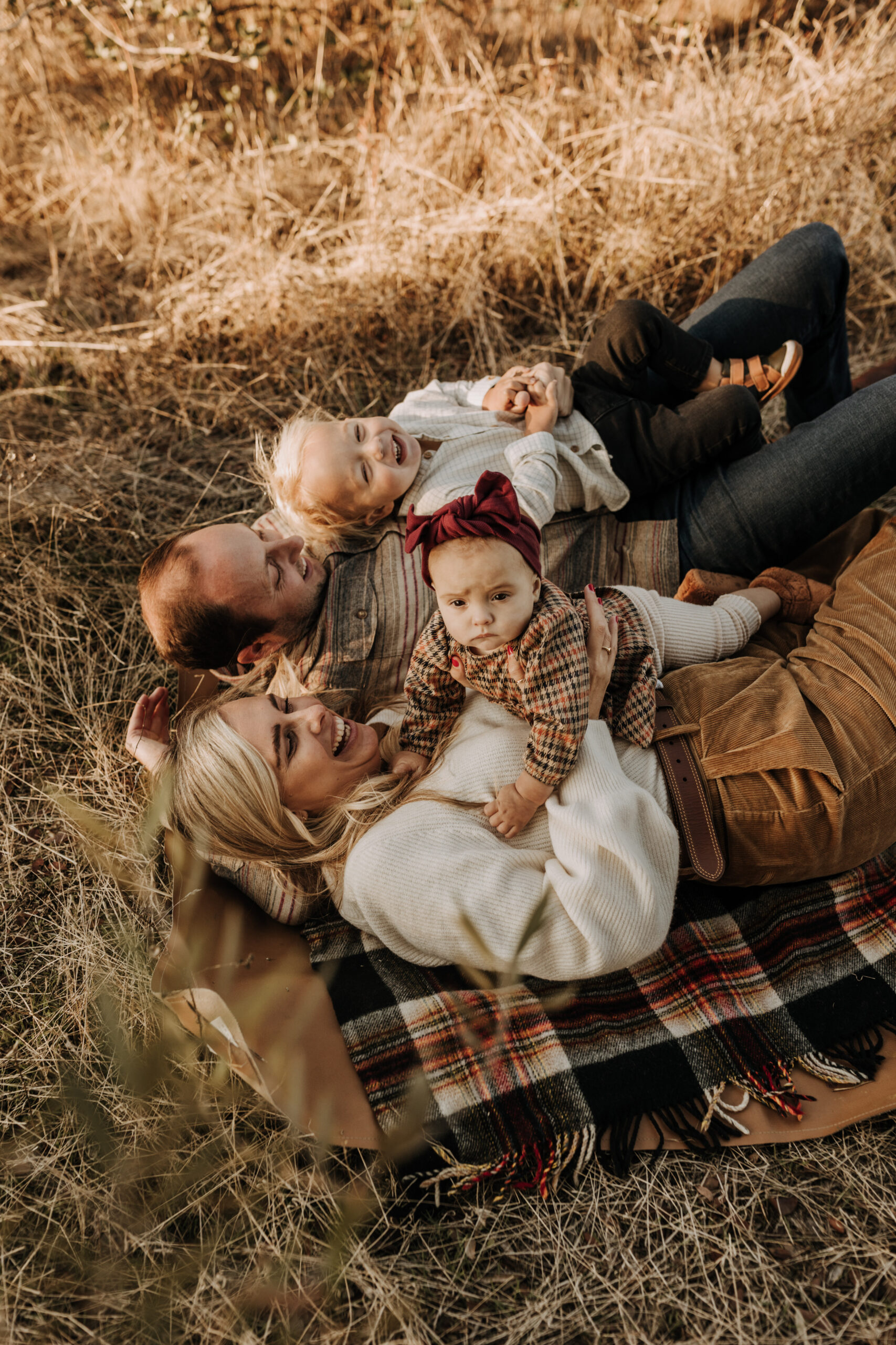 warm toned fall outdoor family photos candid family photos family of four brown colors outdoor San Diego family photographer Sabrina kinsella sabrinalynnphoto