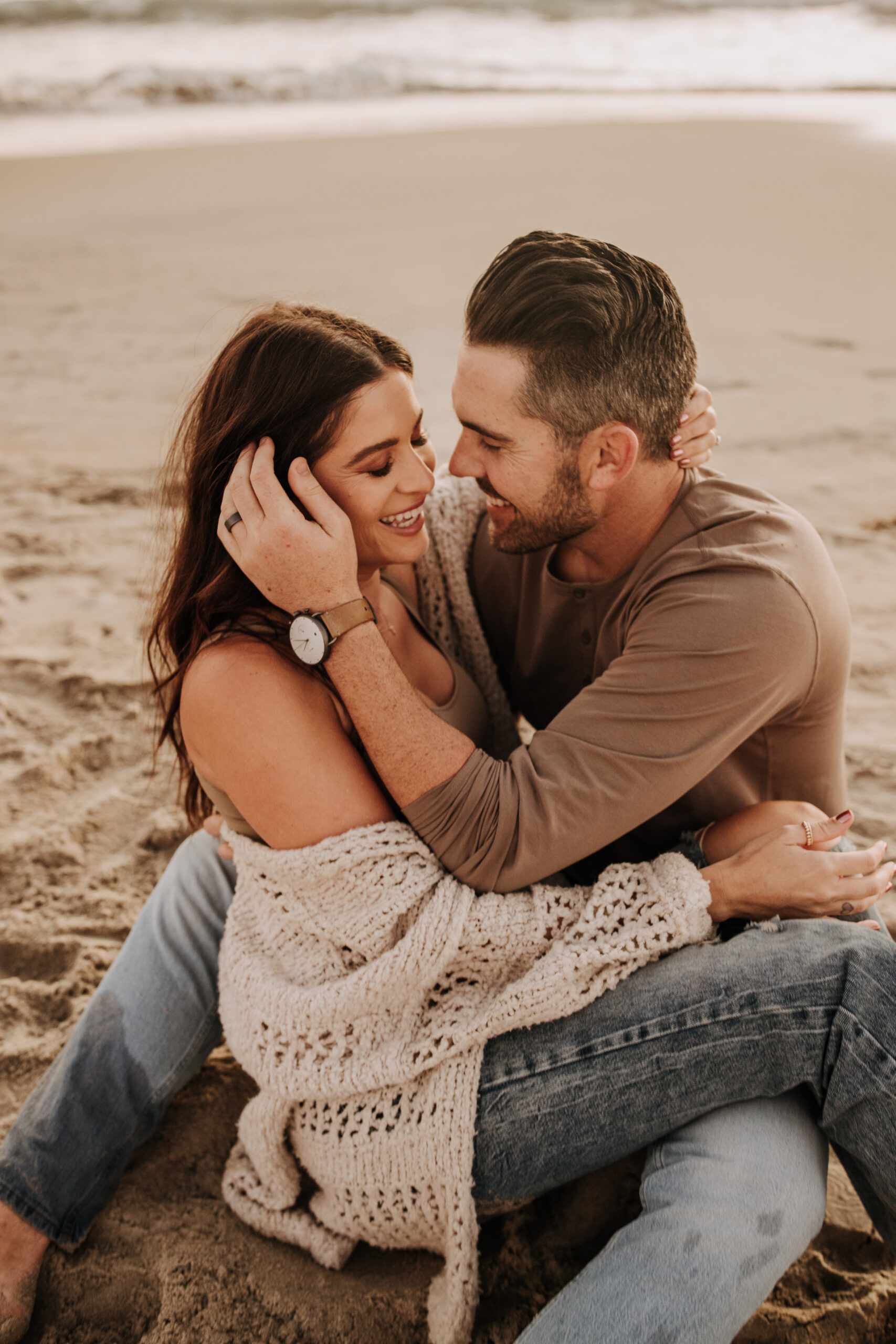 warm neutral sunset beach photos family photos on the beach golden hour family of four candid family photos love San Diego family photographer Sabrina kinsella